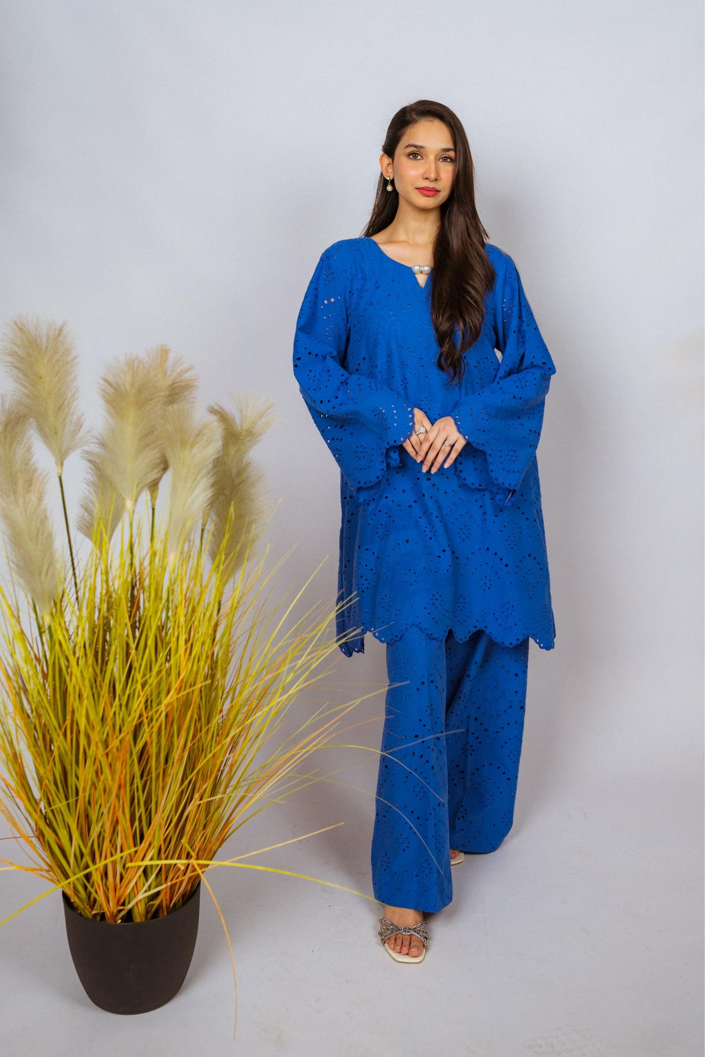 Elegant Shifli Chikan Cord Set featuring intricate embroidery, a button-down top, and matching flared pants for versatile styling.