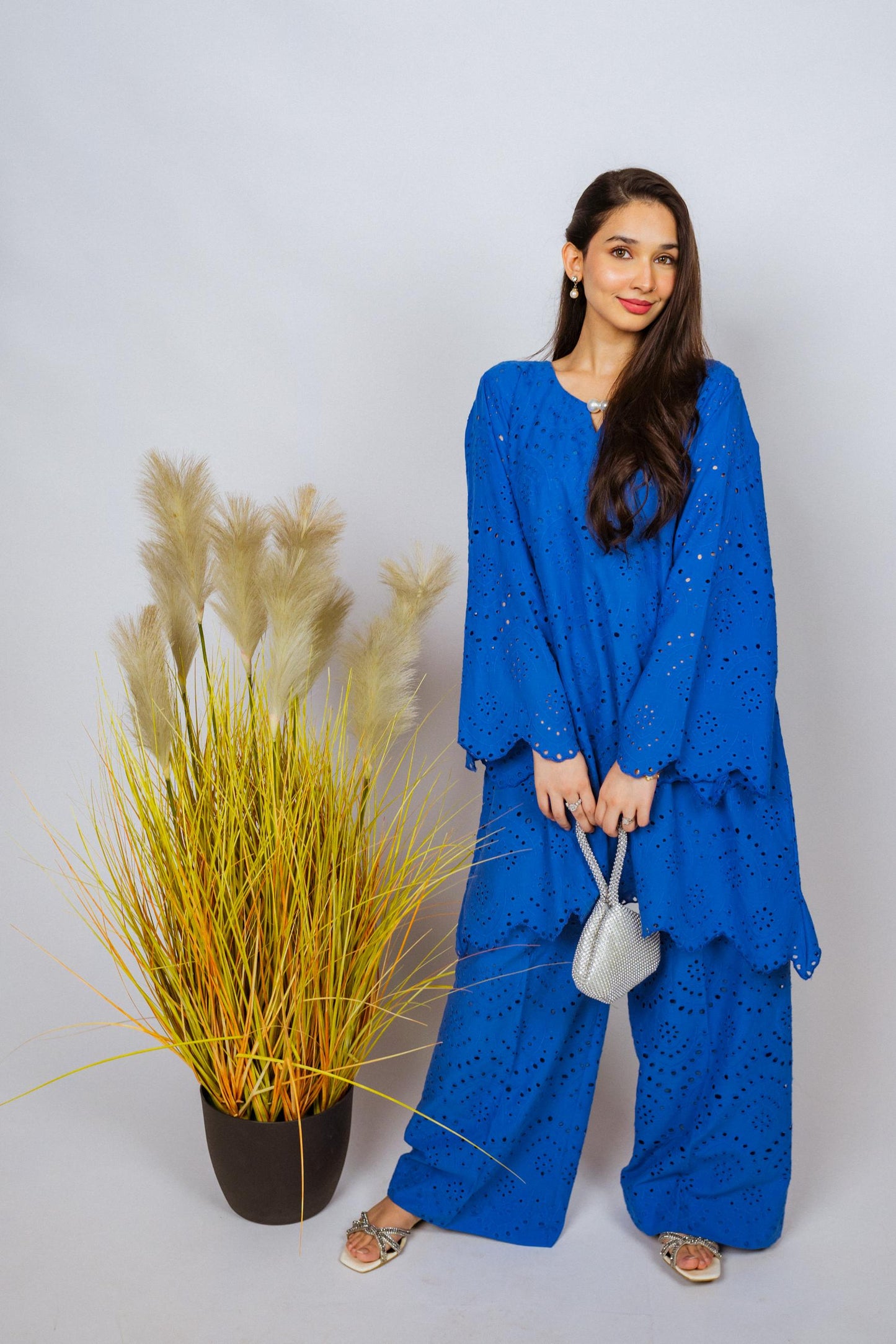 Elegant Shifli Chikan Cord Set featuring intricate embroidery, a button-down top, and matching flared pants for versatile styling.