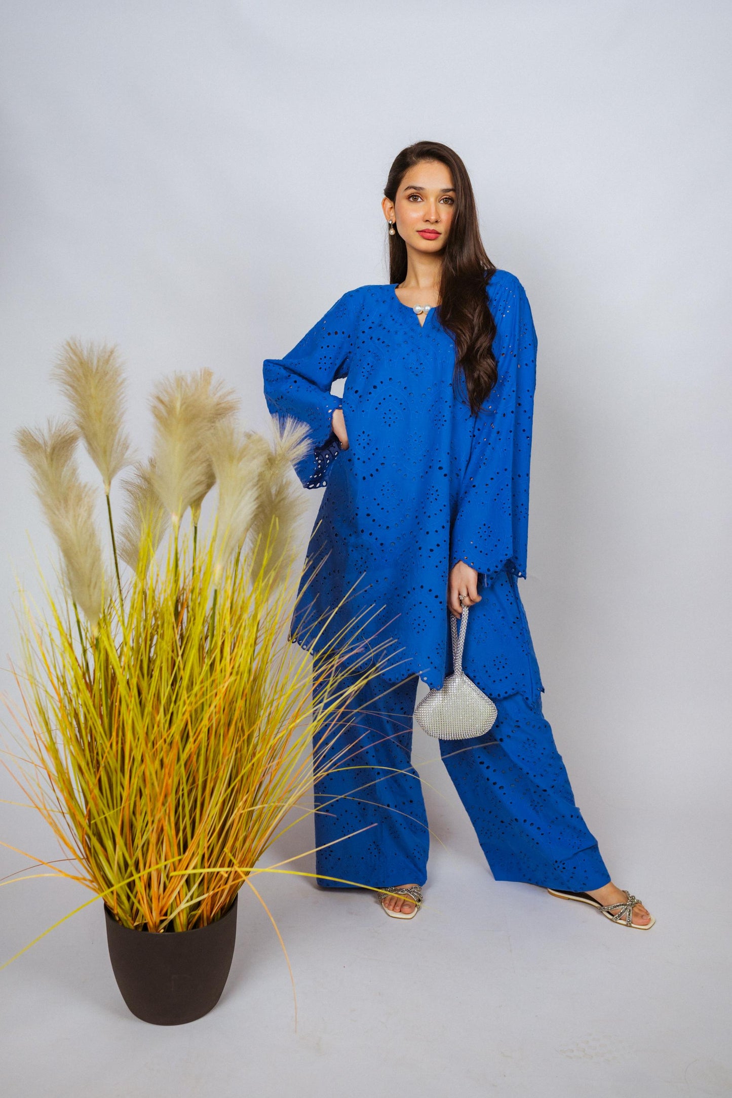 Elegant Shifli Chikan Cord Set featuring intricate embroidery, a button-down top, and matching flared pants for versatile styling.