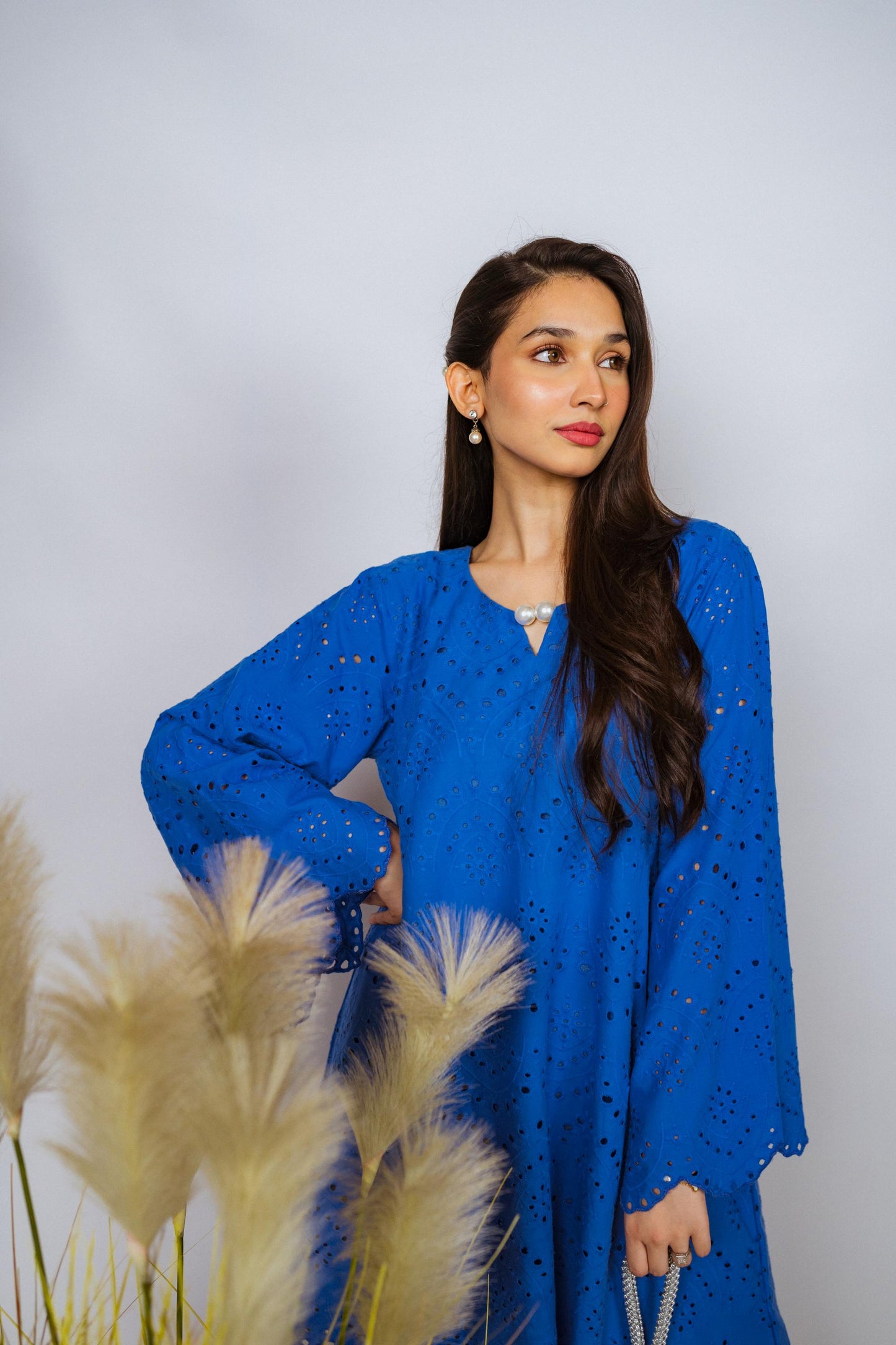 Elegant Shifli Chikan Cord Set featuring intricate embroidery, a button-down top, and matching flared pants for versatile styling.