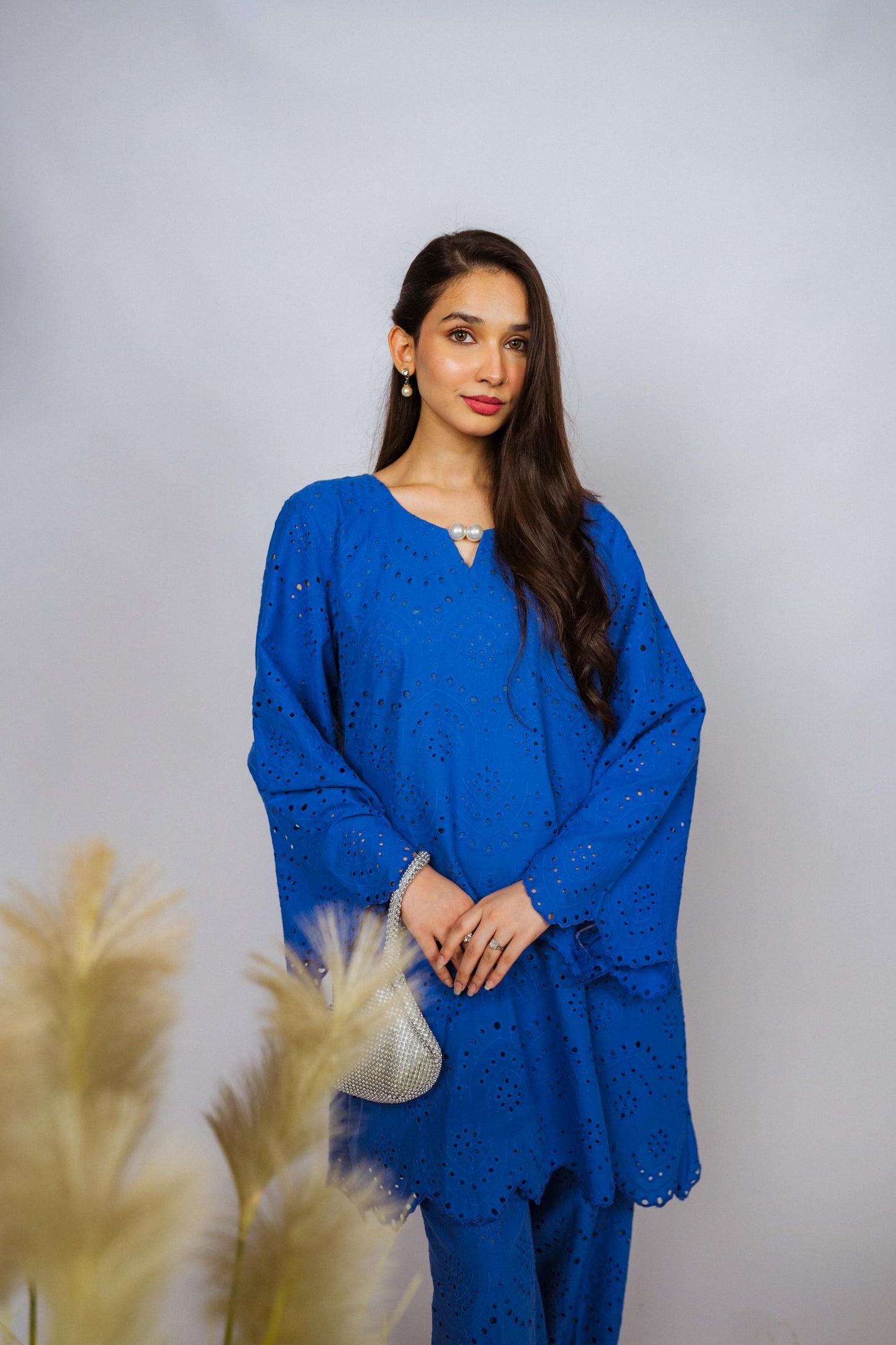 Elegant Shifli Chikan Cord Set featuring intricate embroidery, a button-down top, and matching flared pants for versatile styling.