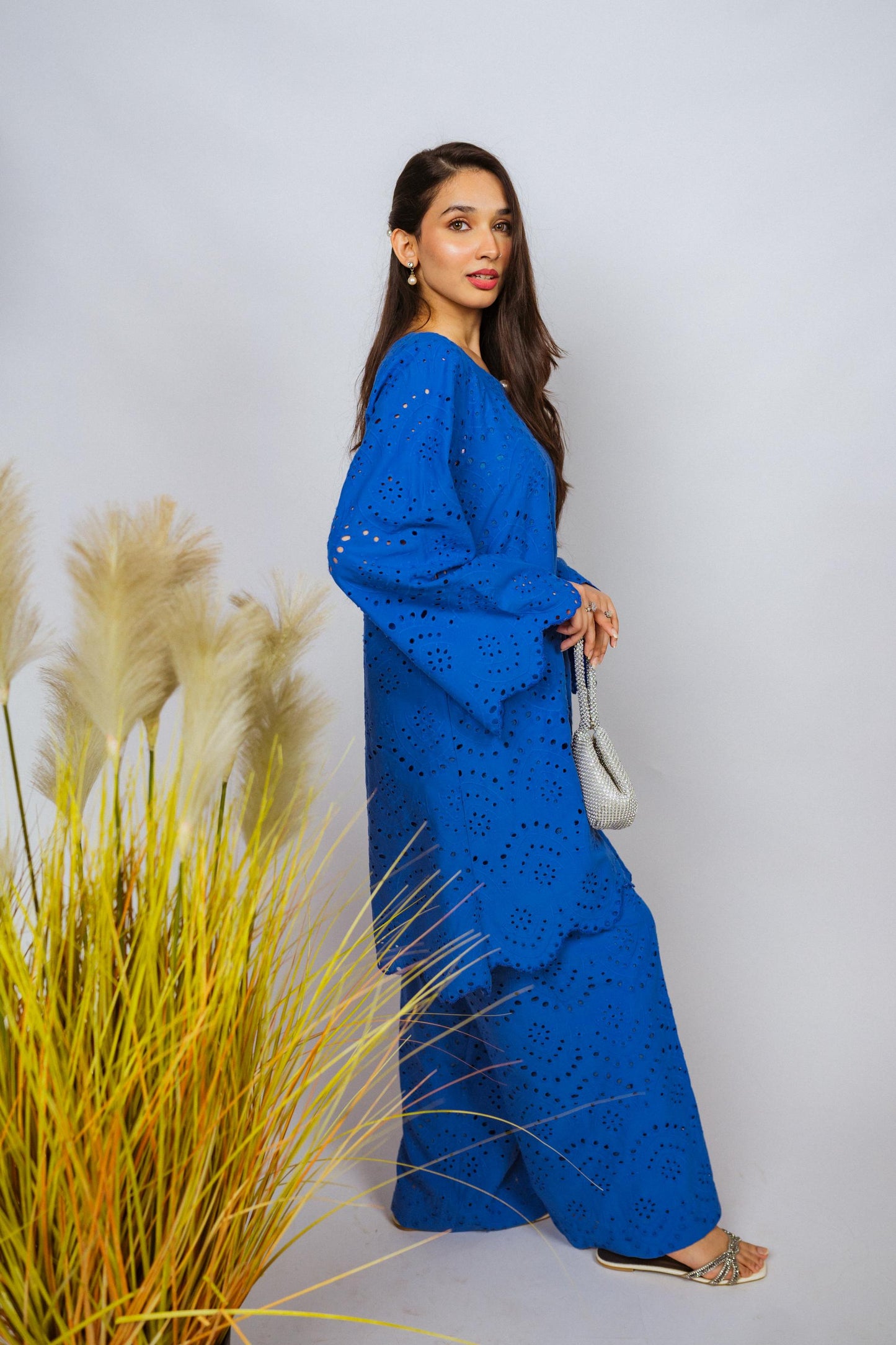 Elegant Shifli Chikan Cord Set featuring intricate embroidery, a button-down top, and matching flared pants for versatile styling.