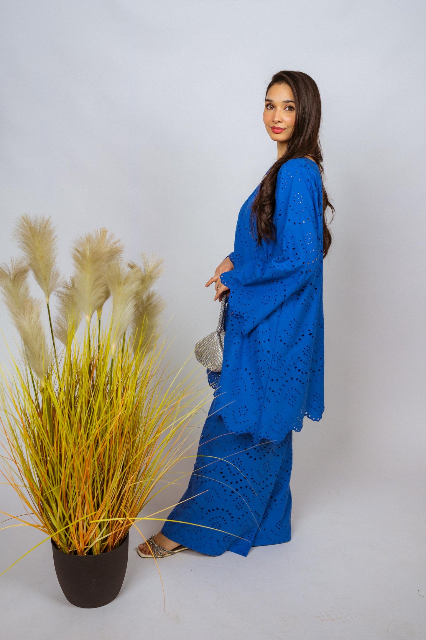 Elegant Shifli Chikan Cord Set featuring intricate embroidery, a button-down top, and matching flared pants for versatile styling.