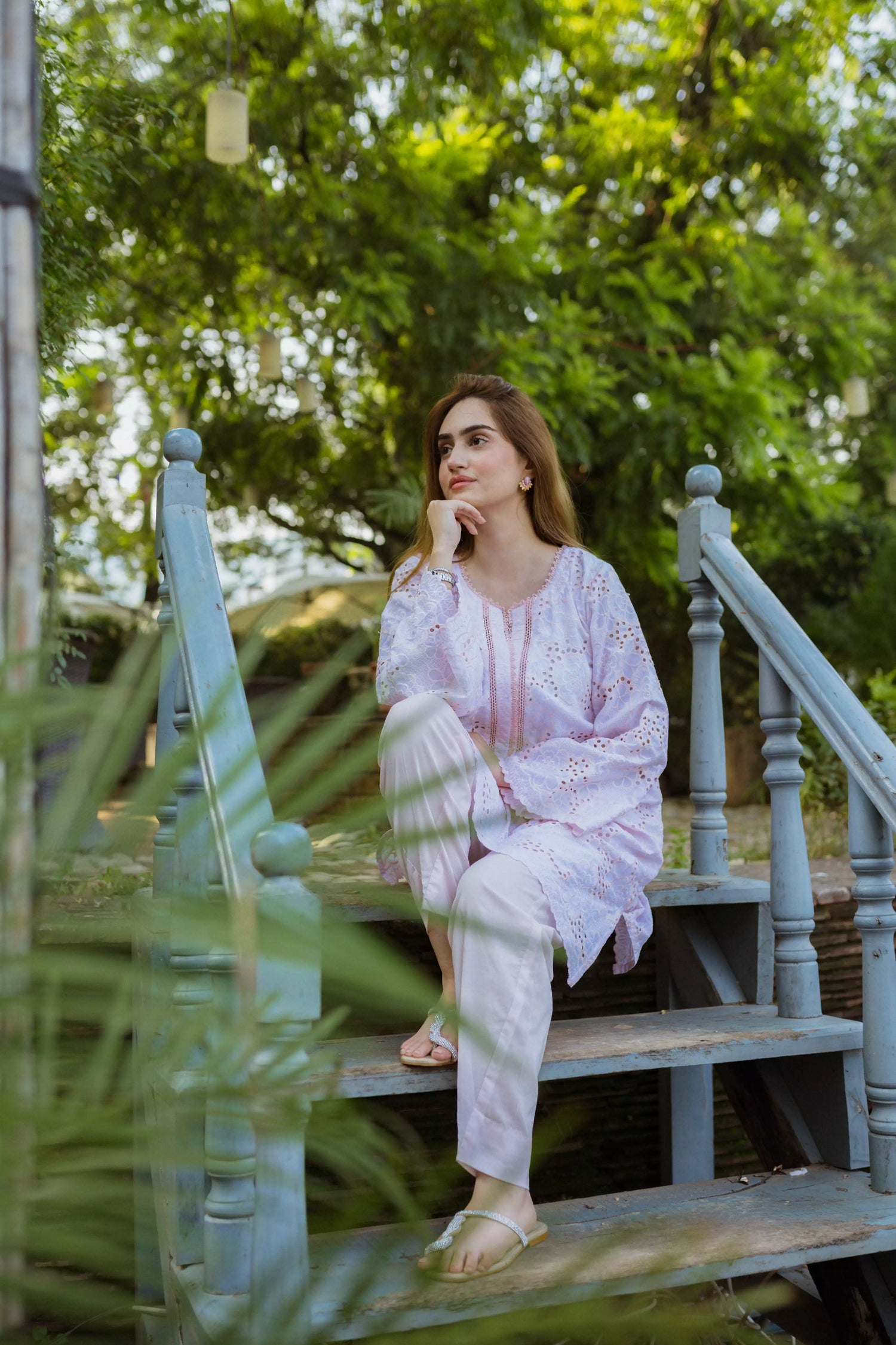 Elegant powder pink kurta featuring detailed Shifli Chikan cutwork and lace accents, complemented by a straight Khari Shalwar.