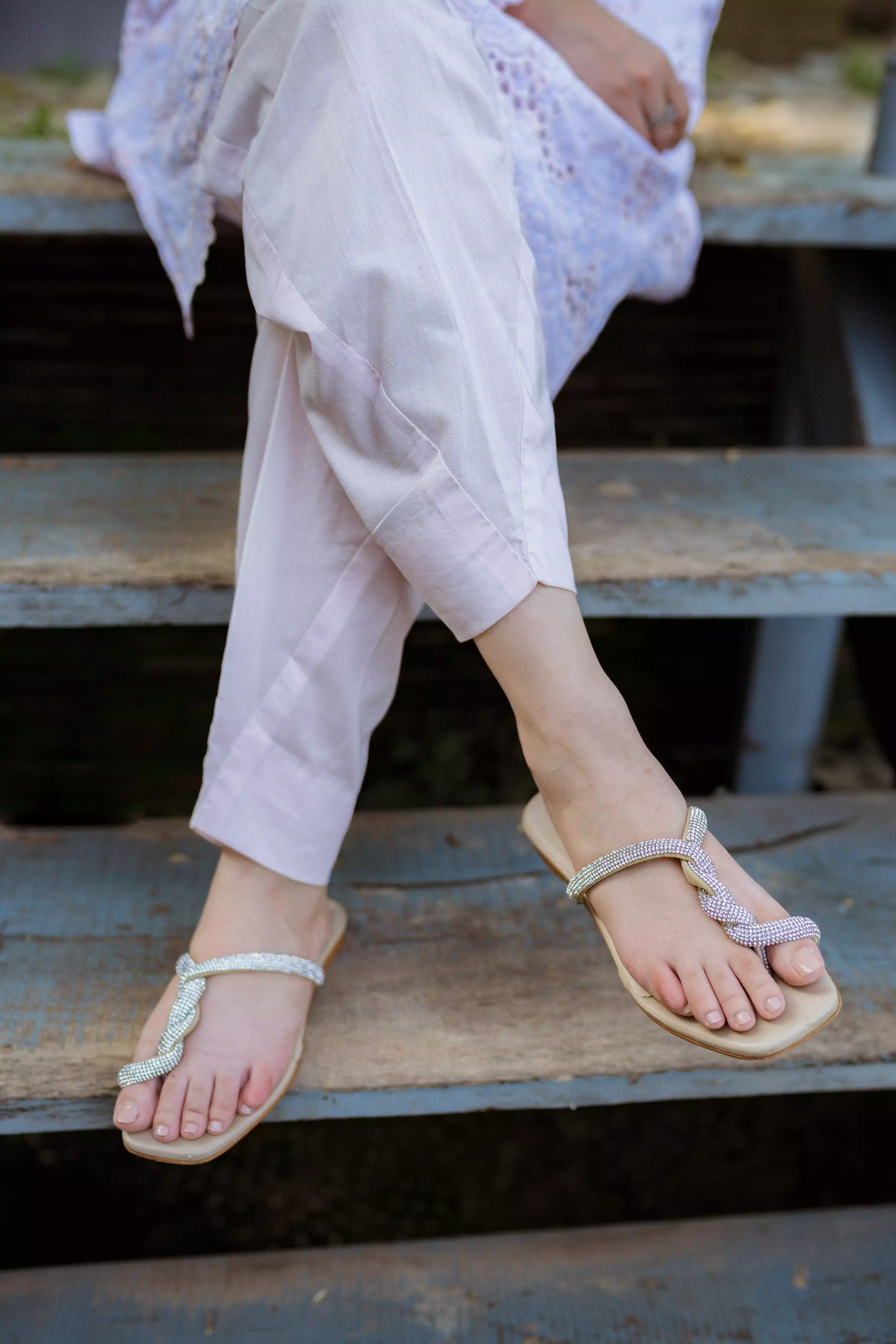 Elegant powder pink kurta featuring detailed Shifli Chikan cutwork and lace accents, complemented by a straight Khari Shalwar.