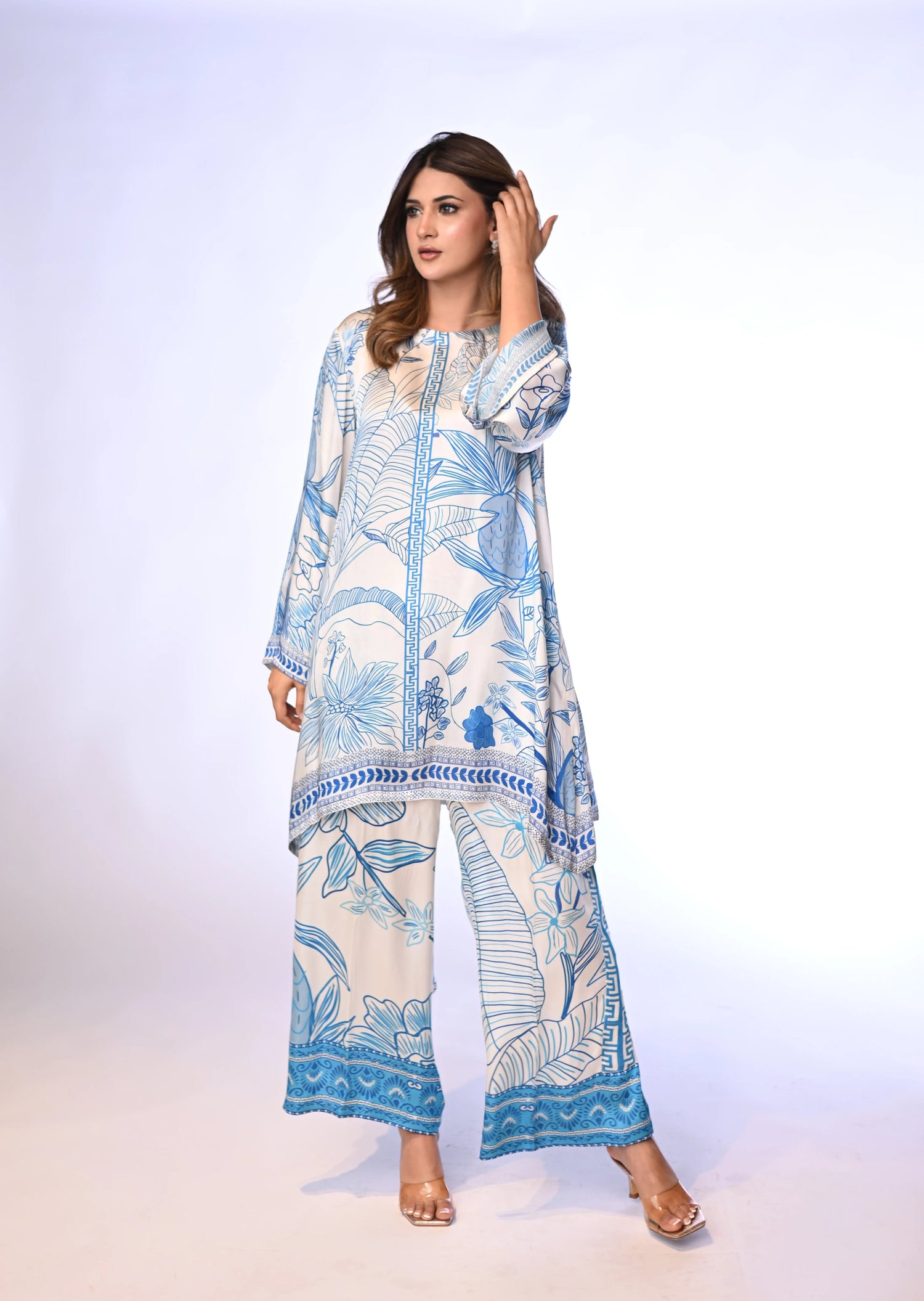 Blue and white silk cord set with a hand-drawn print, featuring a relaxed fit for effortless chic style and comfort.