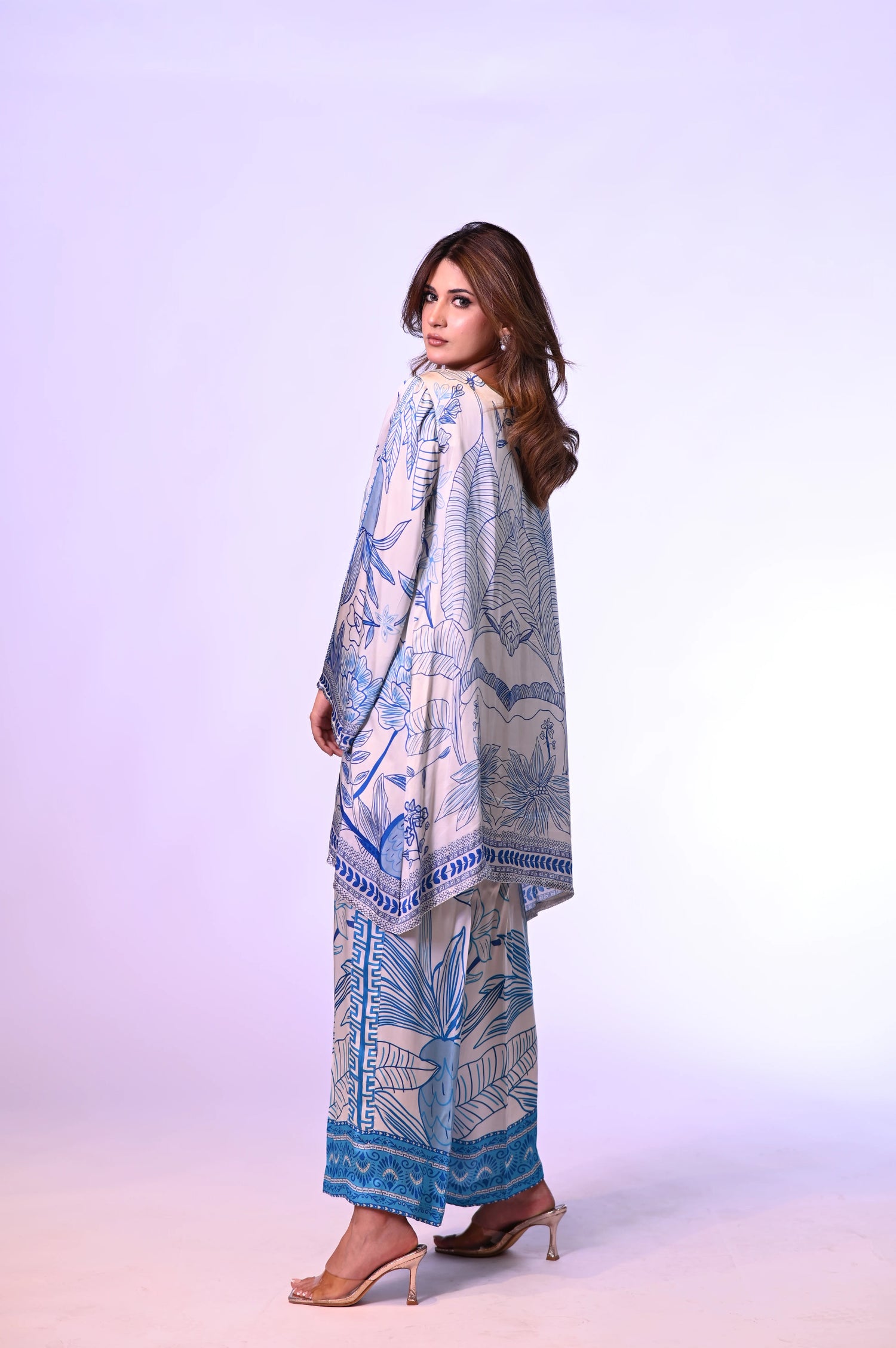 Blue and white silk cord set with a hand-drawn print, featuring a relaxed fit for effortless chic style and comfort.