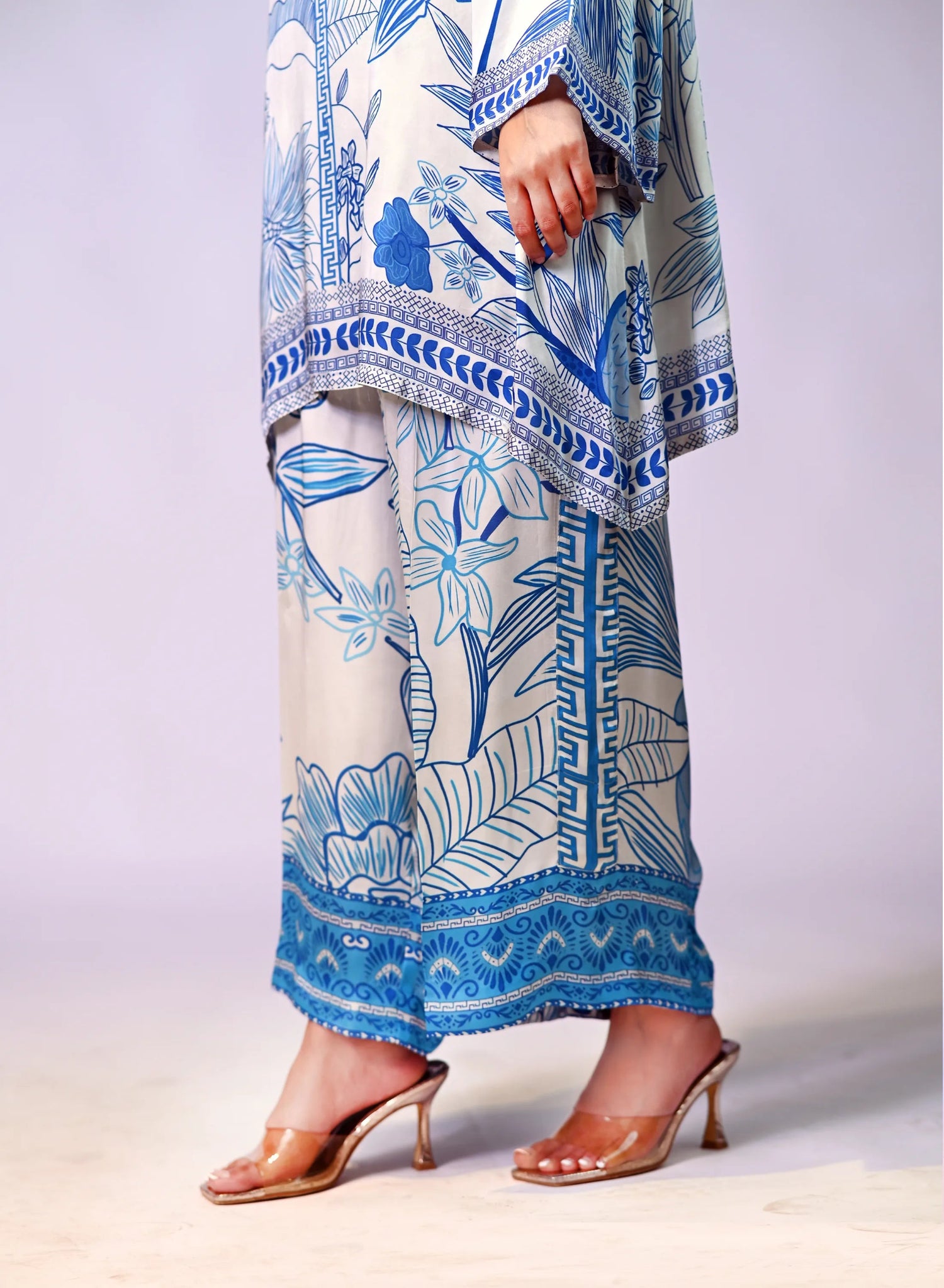 Blue and white silk cord set with a hand-drawn print, featuring a relaxed fit for effortless chic style and comfort.