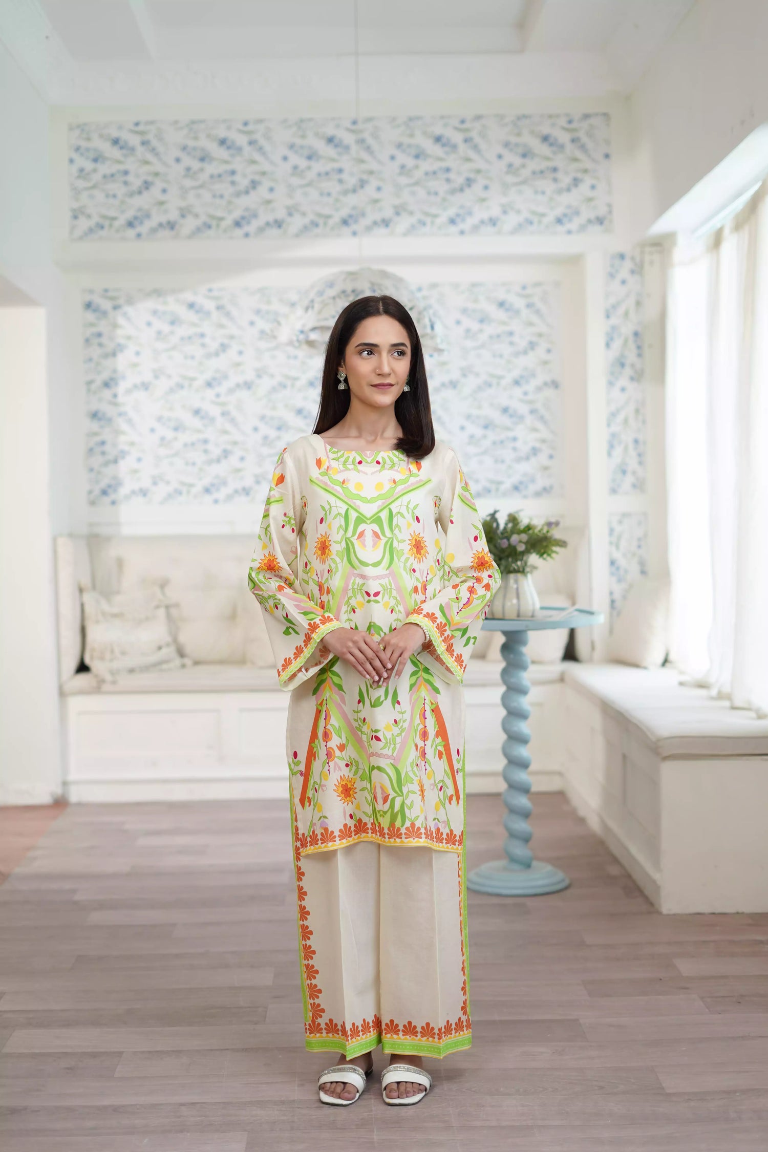 Wrap yourself in summer charm with Buttercream Belle in warm shades of orange, yellow, green, and off-white blended with modern elegance.