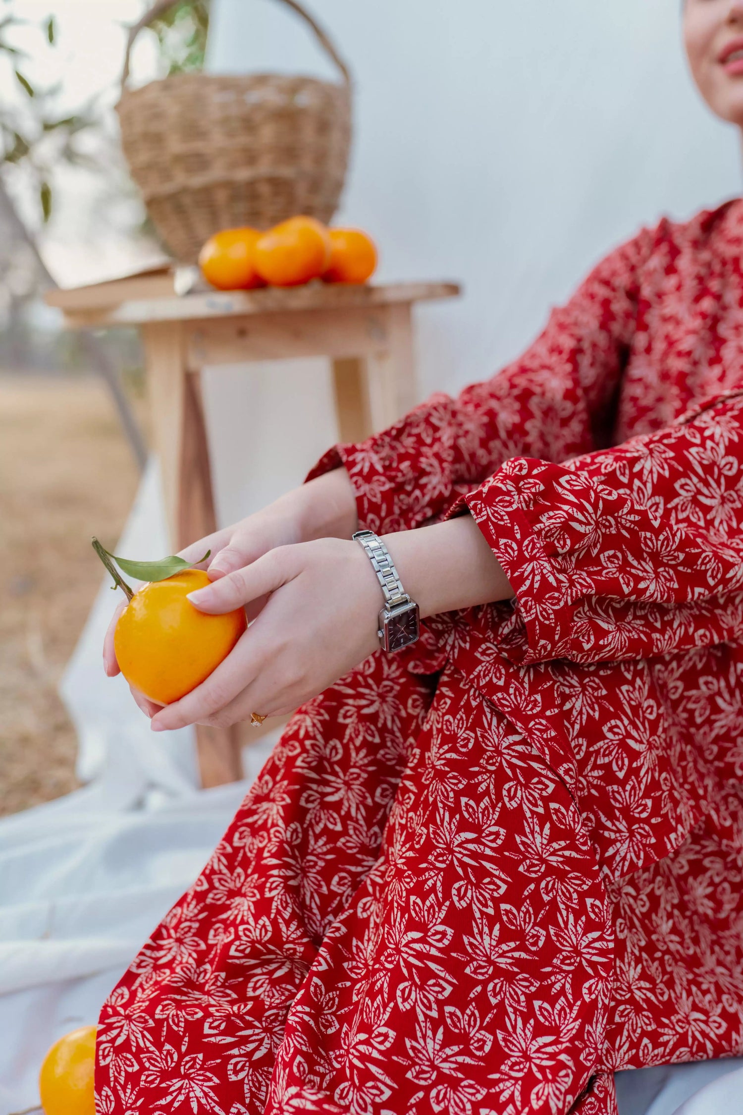 Chic maroon ensemble with bold floral design and puff sleeves, paired with loose-fit shalwar.