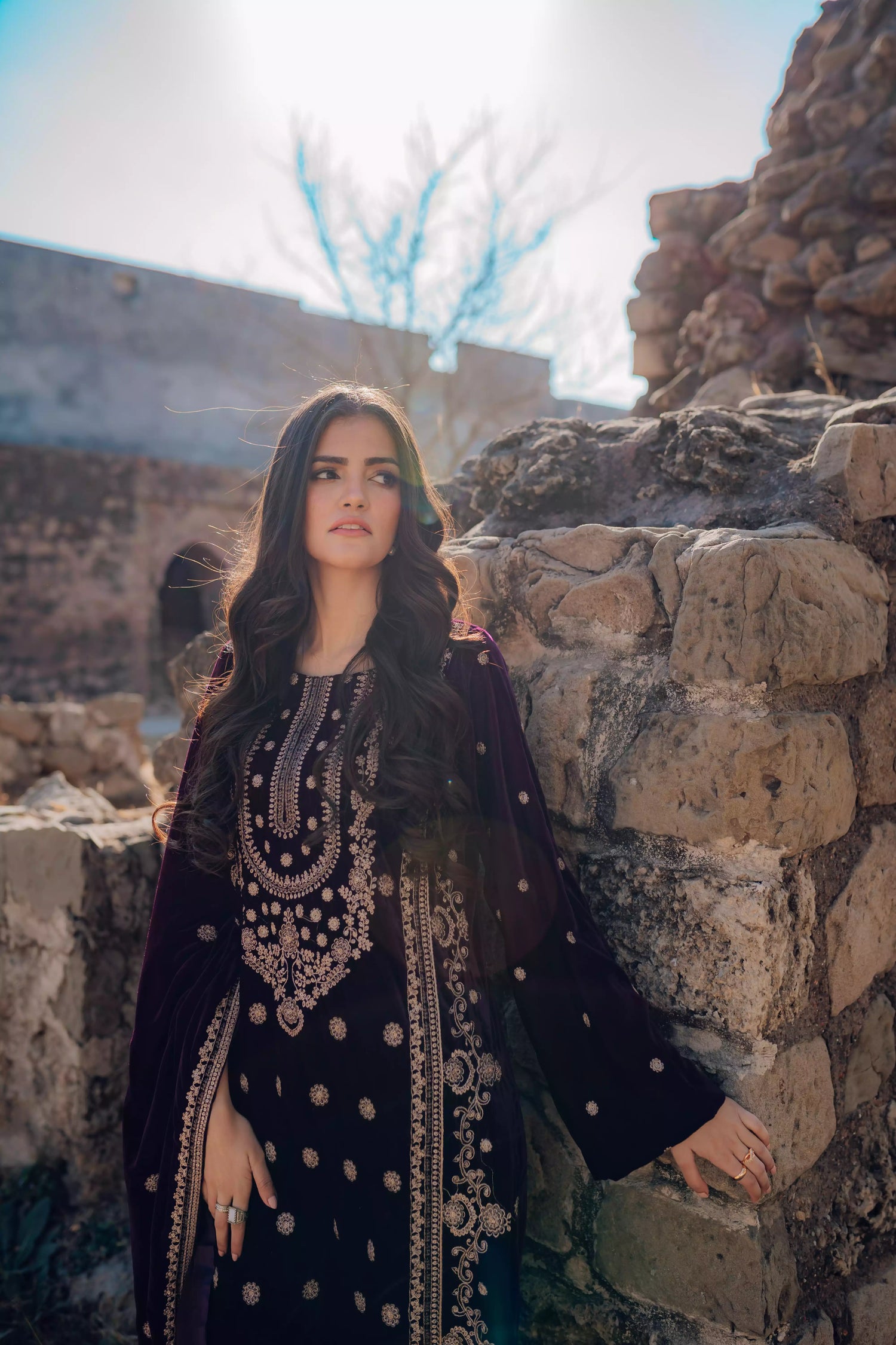 Exquisite velvet suit with intricate shirt embroidery, a detailed velvet shawl, and plain pants for a refined, elegant contrast.