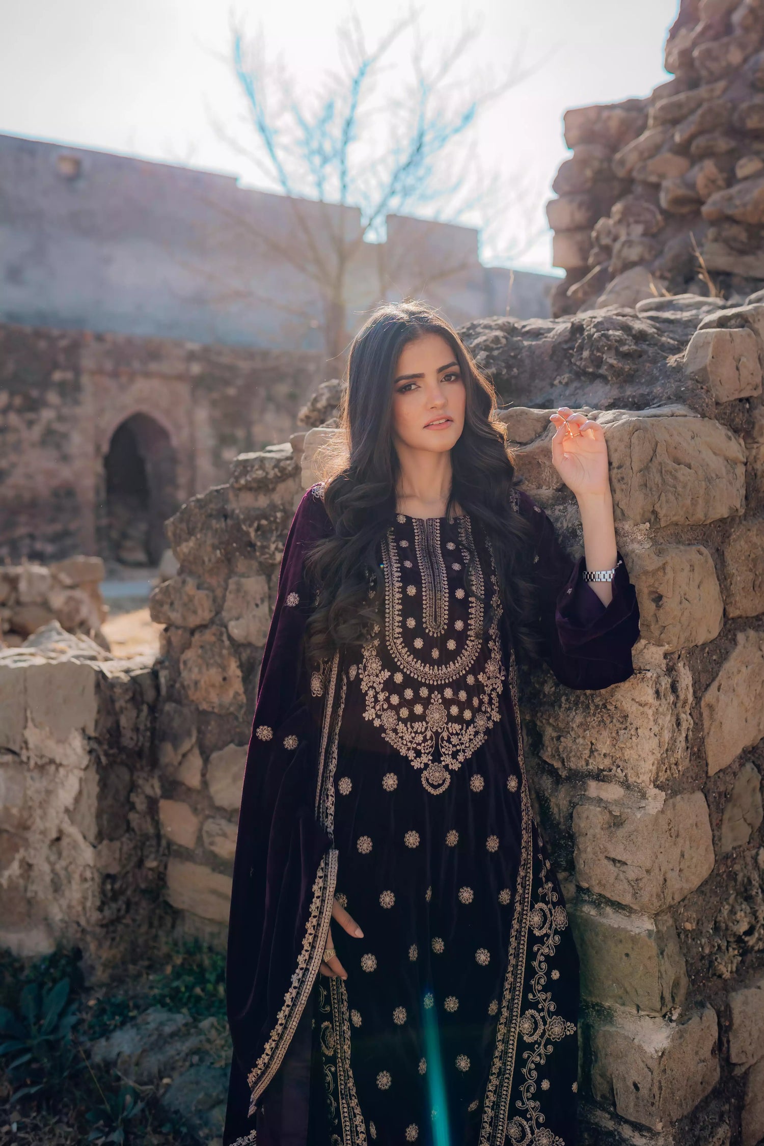 Exquisite velvet suit with intricate shirt embroidery, a detailed velvet shawl, and plain pants for a refined, elegant contrast.