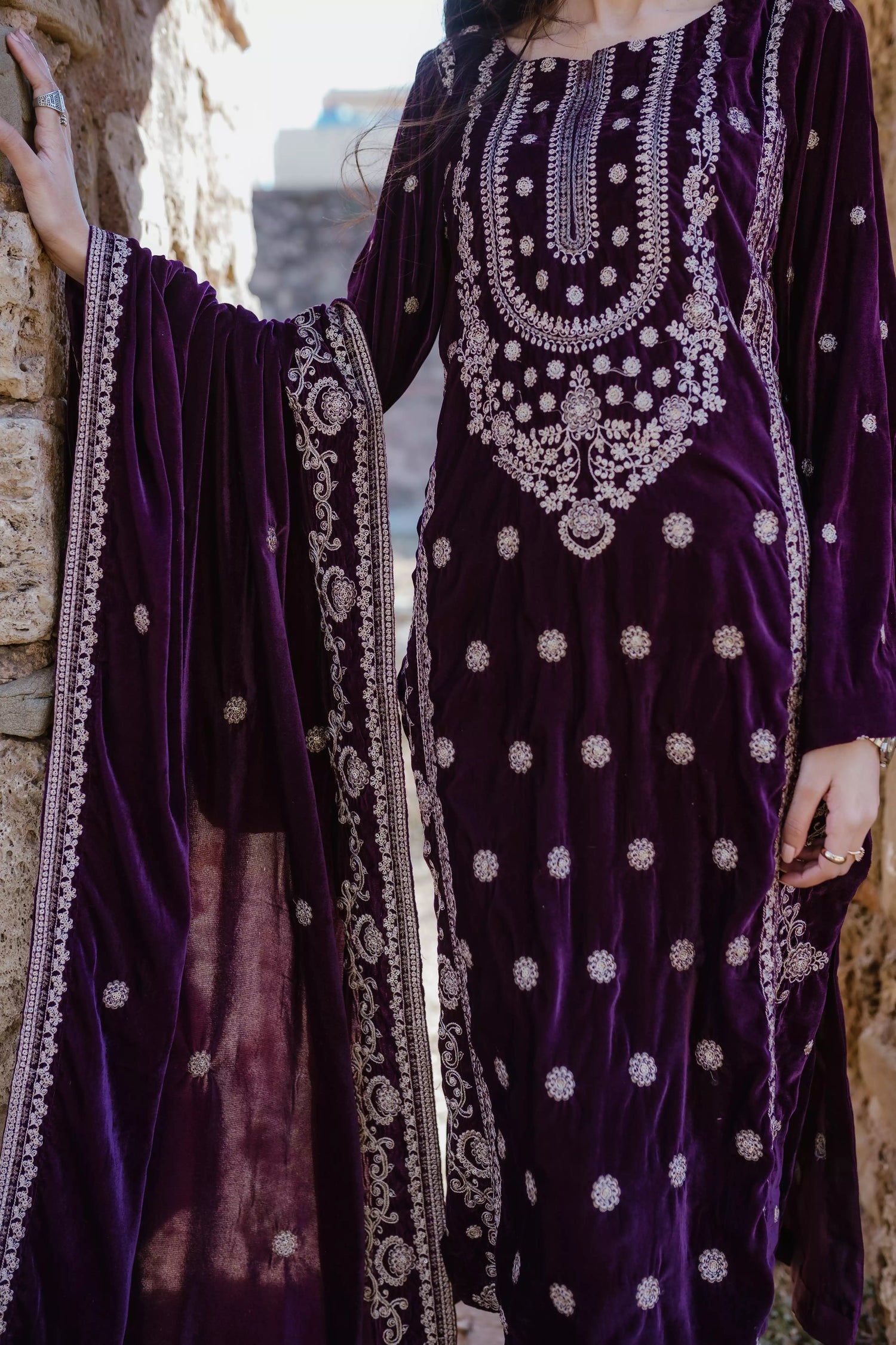 Exquisite velvet suit with intricate shirt embroidery, a detailed velvet shawl, and plain pants for a refined, elegant contrast.