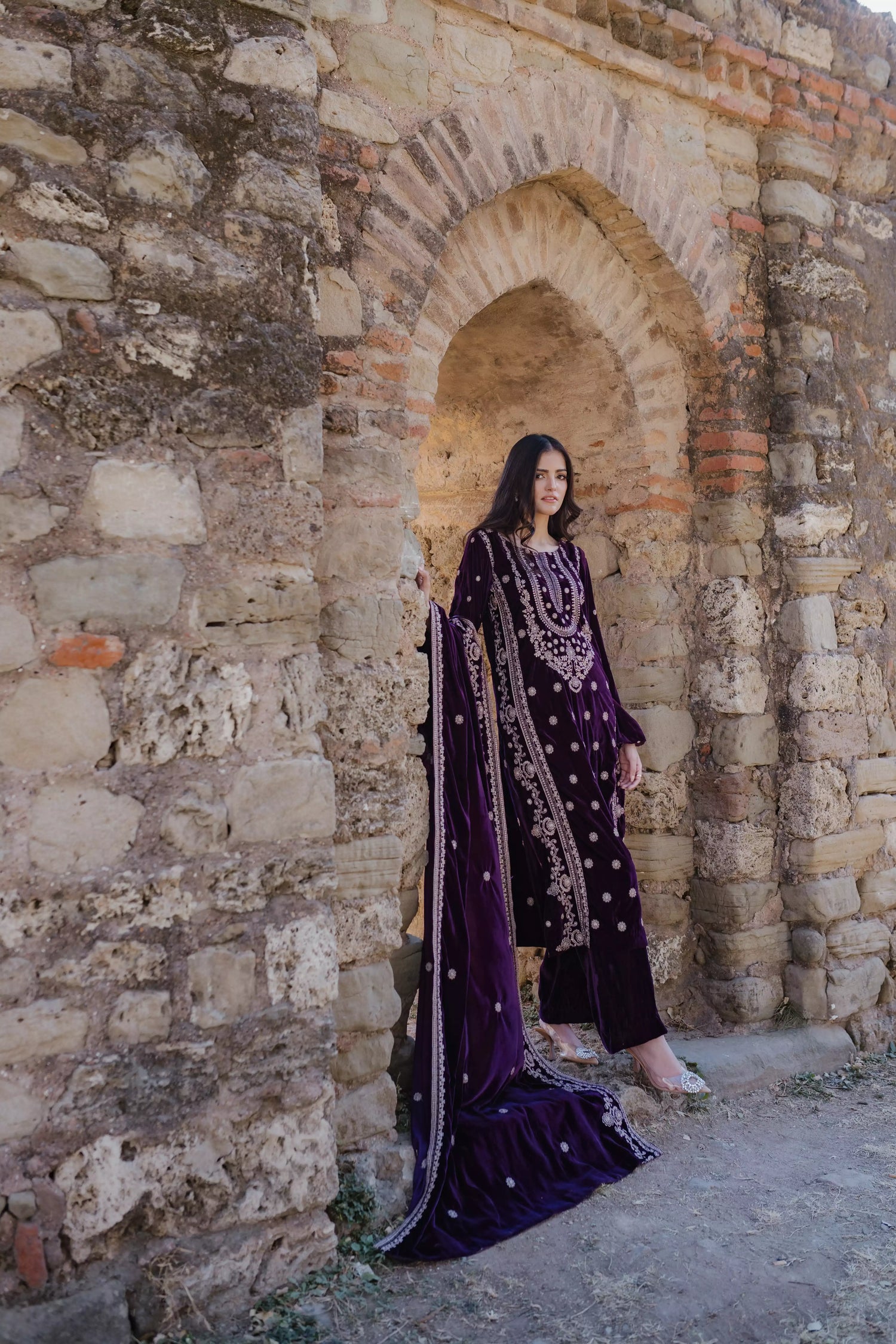 Exquisite velvet suit with intricate shirt embroidery, a detailed velvet shawl, and plain pants for a refined, elegant contrast.