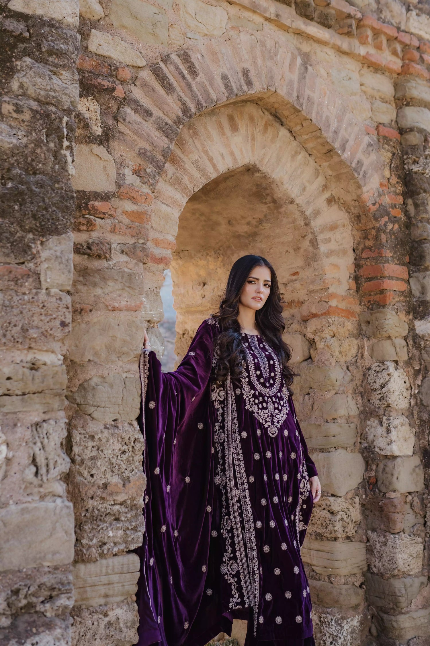 Exquisite velvet suit with intricate shirt embroidery, a detailed velvet shawl, and plain pants for a refined, elegant contrast.