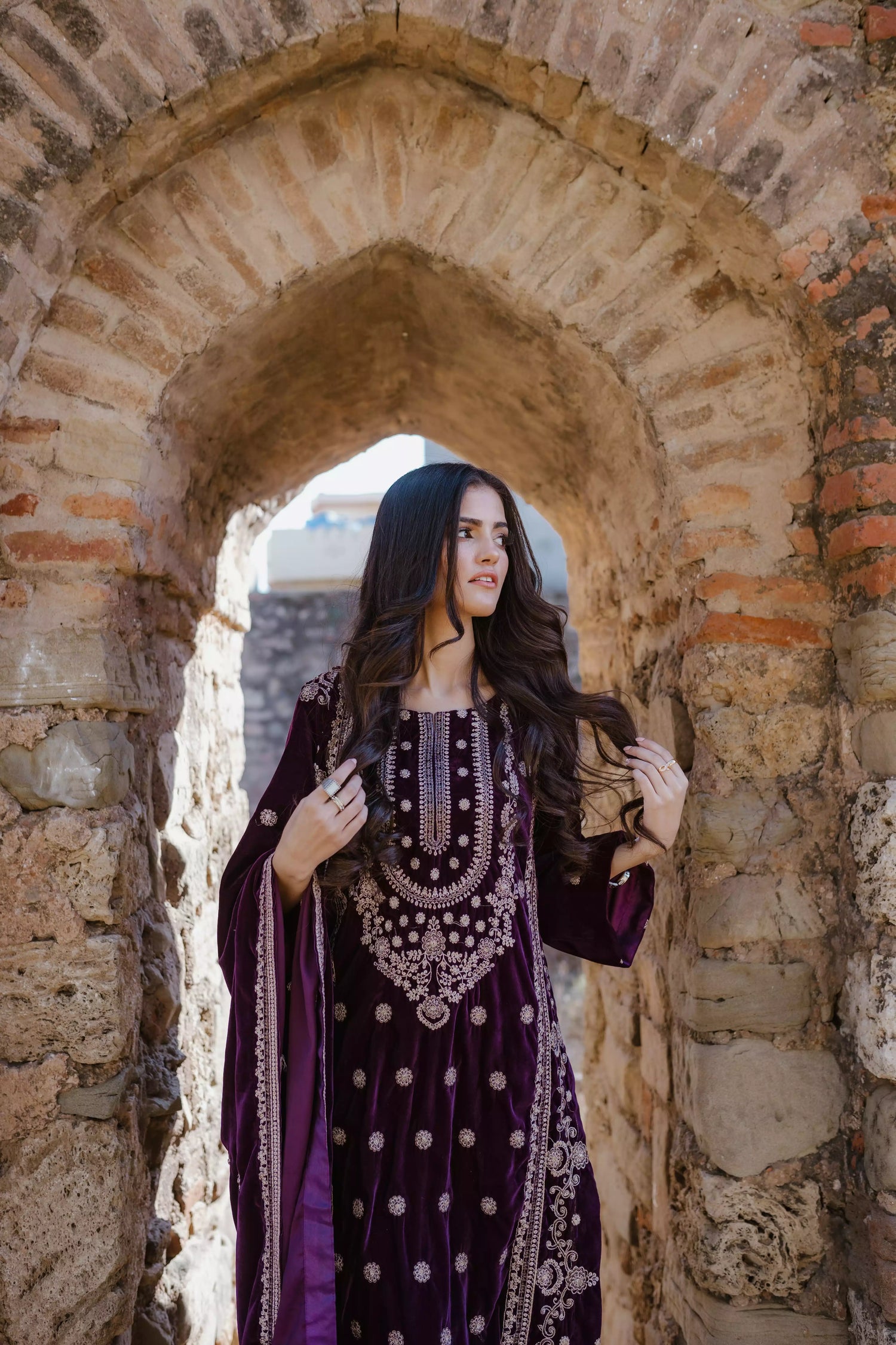 Exquisite velvet suit with intricate shirt embroidery, a detailed velvet shawl, and plain pants for a refined, elegant contrast.