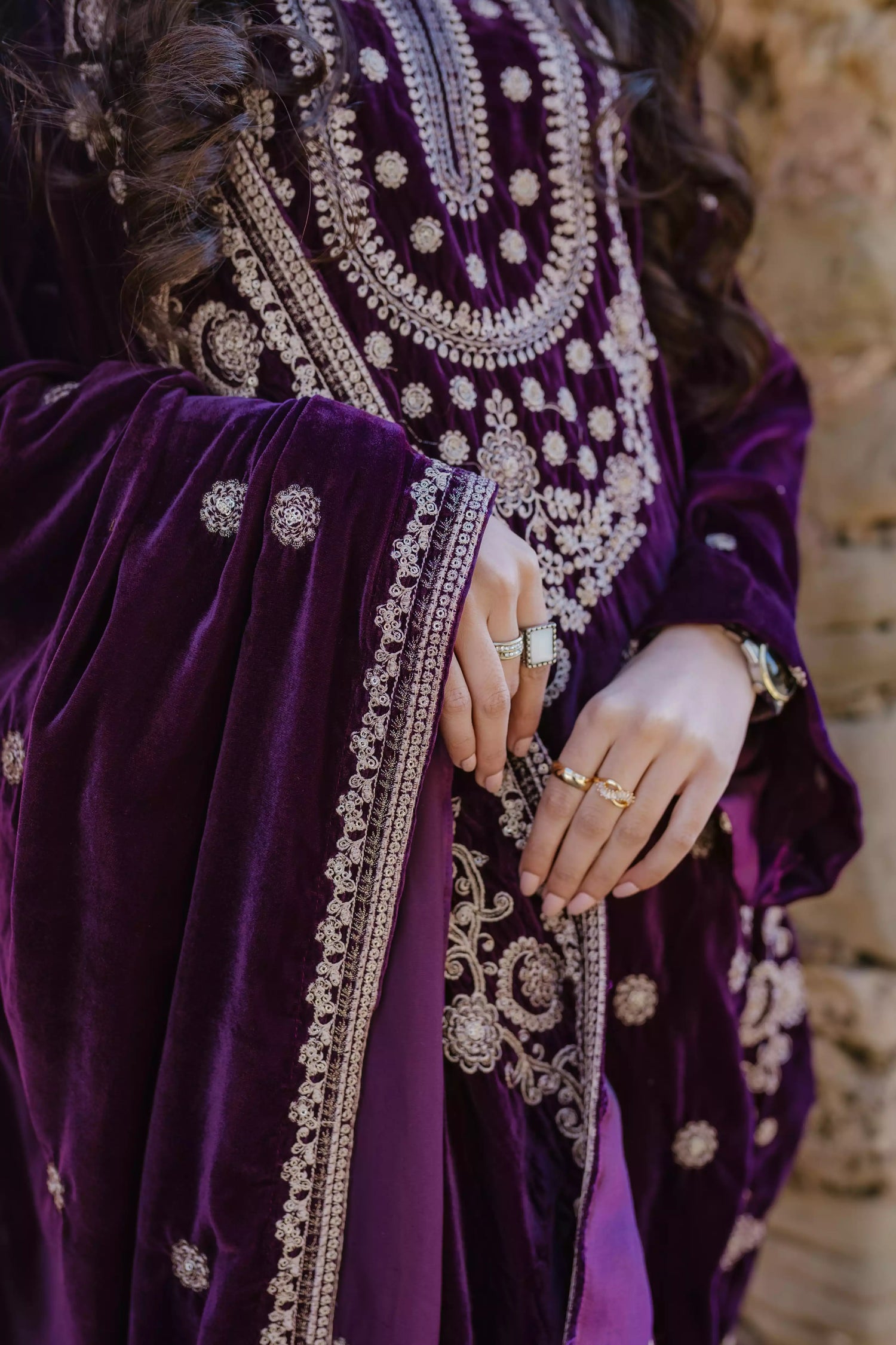 Exquisite velvet suit with intricate shirt embroidery, a detailed velvet shawl, and plain pants for a refined, elegant contrast.