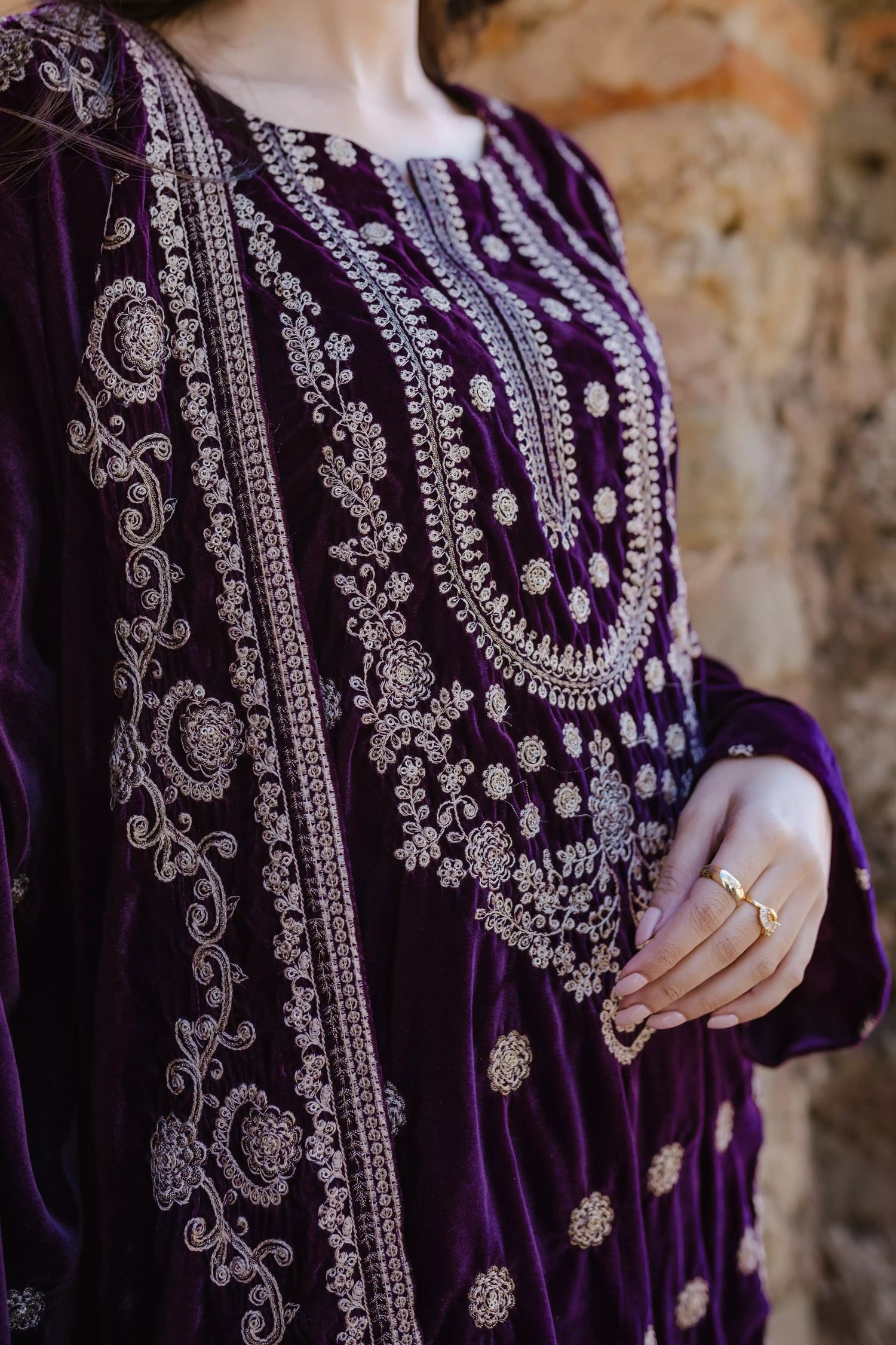 Exquisite velvet suit with intricate shirt embroidery, a detailed velvet shawl, and plain pants for a refined, elegant contrast.
