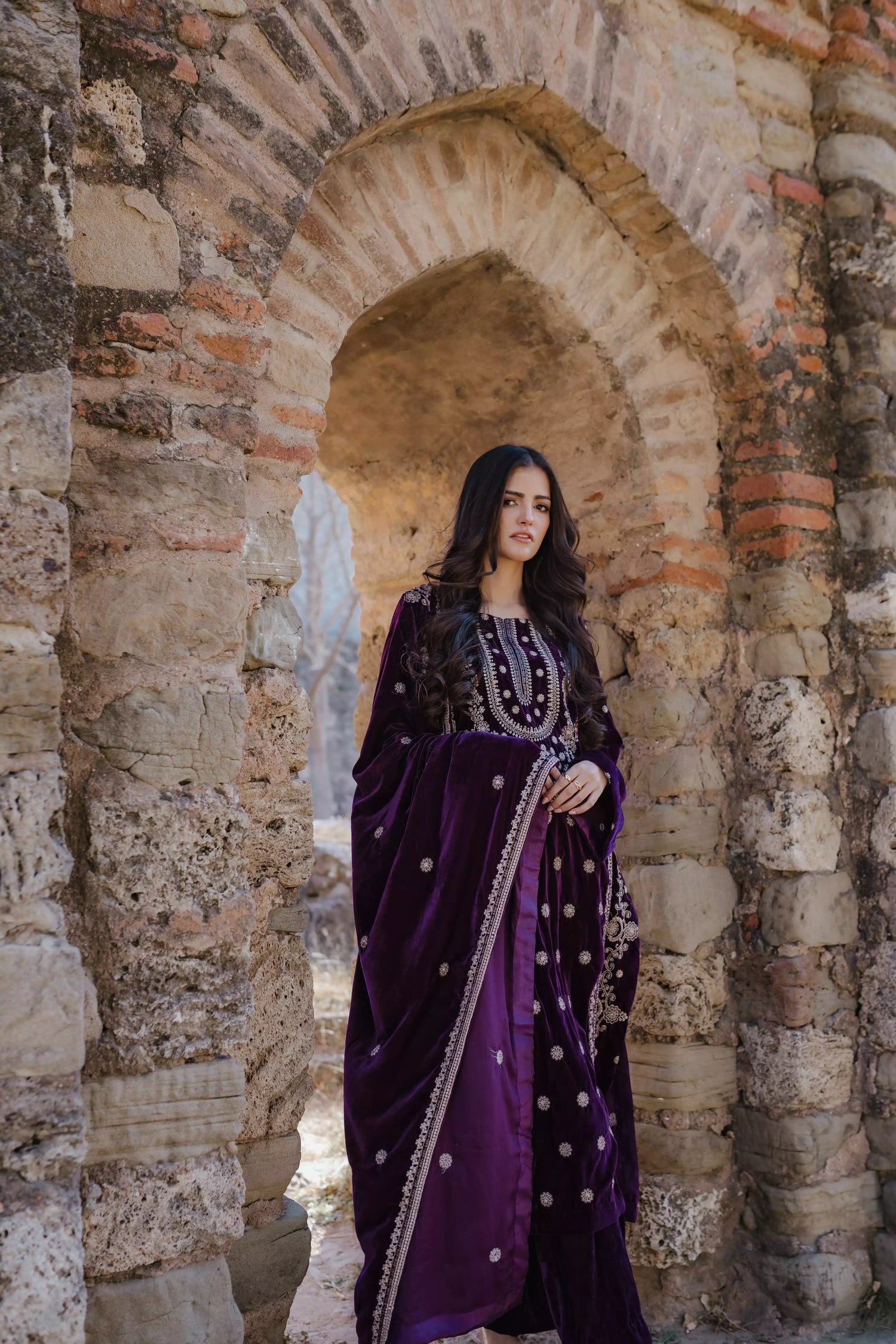 Exquisite velvet suit with intricate shirt embroidery, a detailed velvet shawl, and plain pants for a refined, elegant contrast.