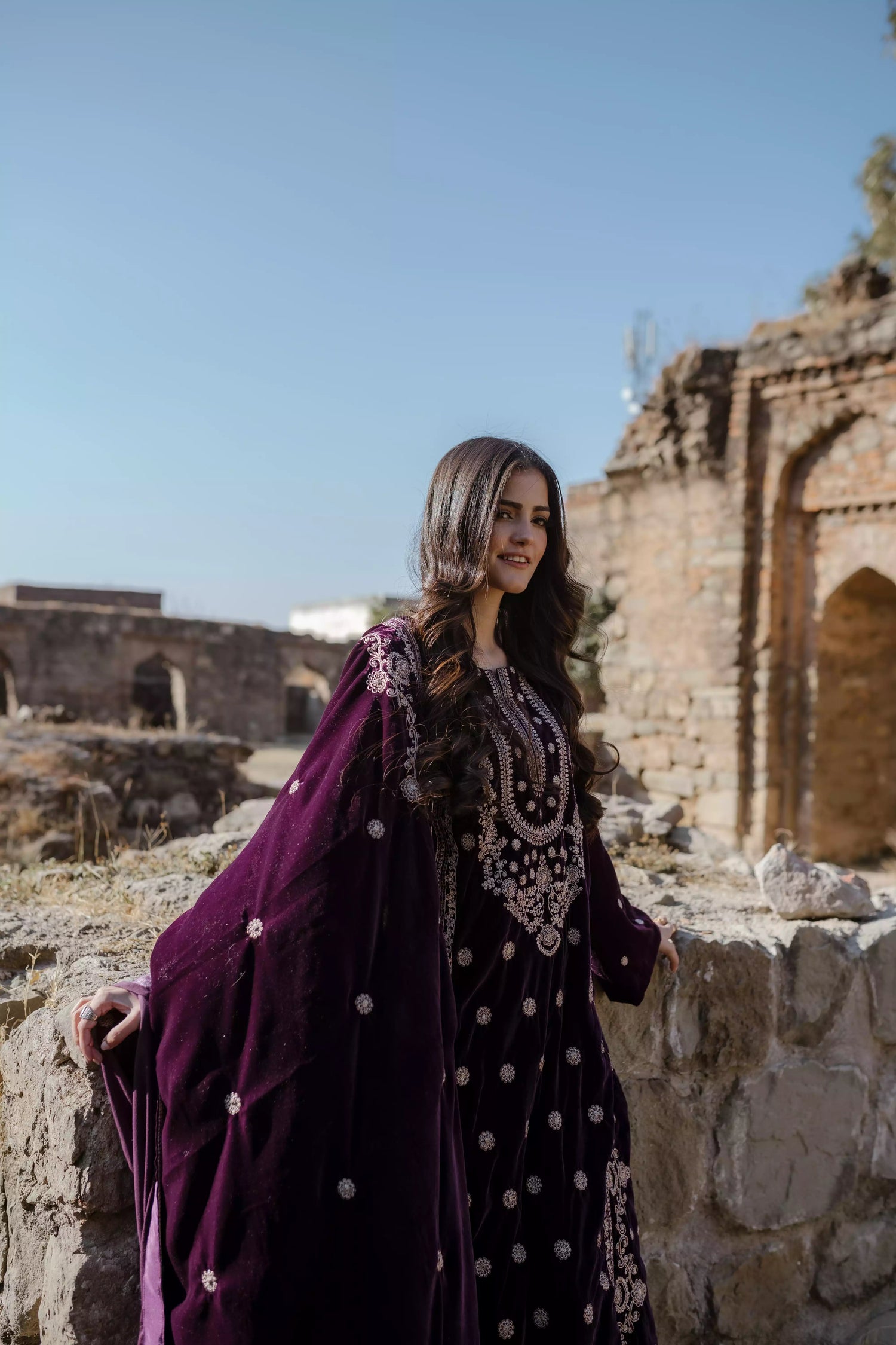 Exquisite velvet suit with intricate shirt embroidery, a detailed velvet shawl, and plain pants for a refined, elegant contrast.