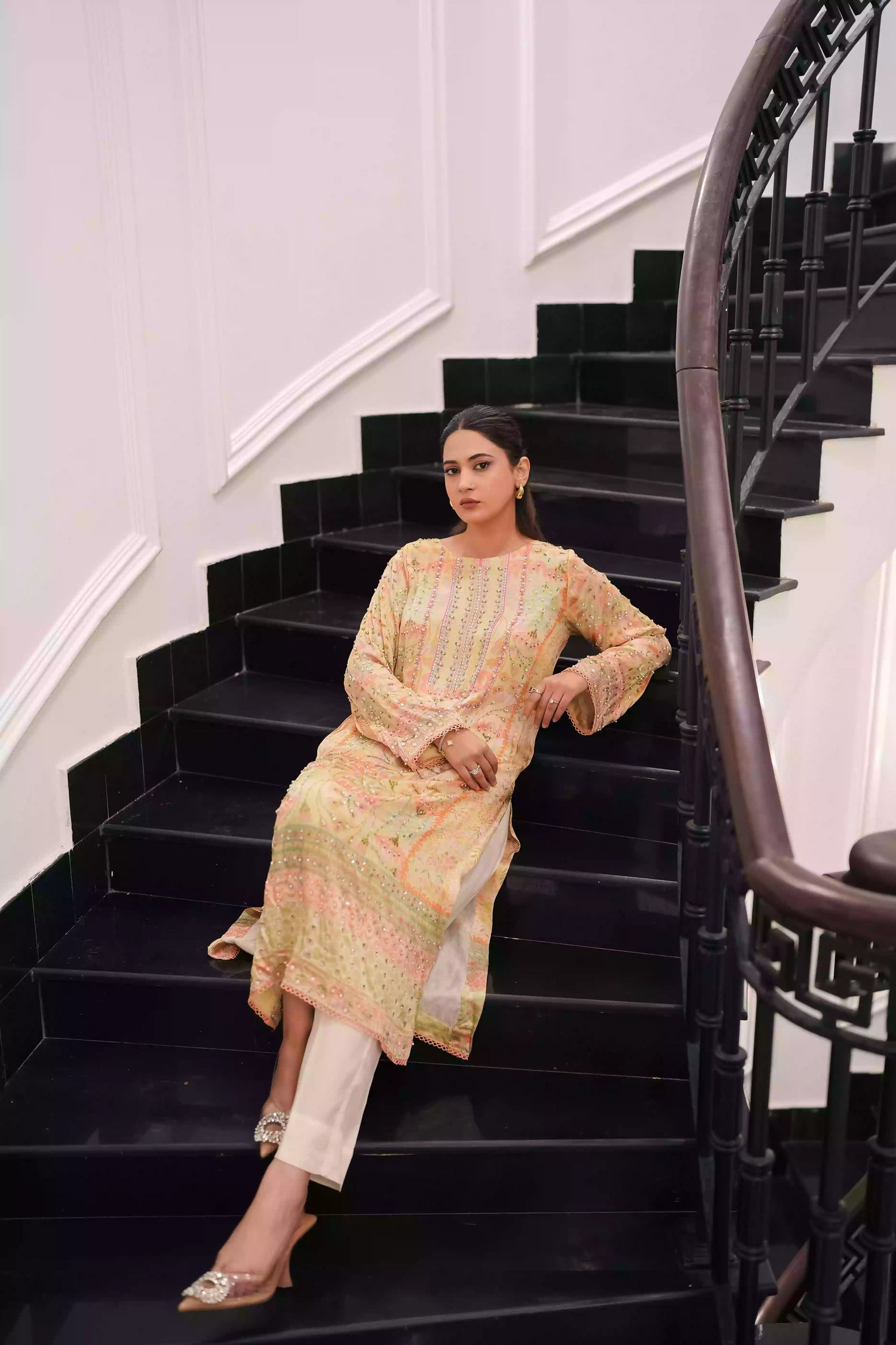 Lime yellow silk kurta in a soft pastel tone, featuring intricate floral embellishment on full-length sleeves, and a relaxed elegant silhouette, designed for festive eid gatherings, daytime celebrations, and refined evening wear.