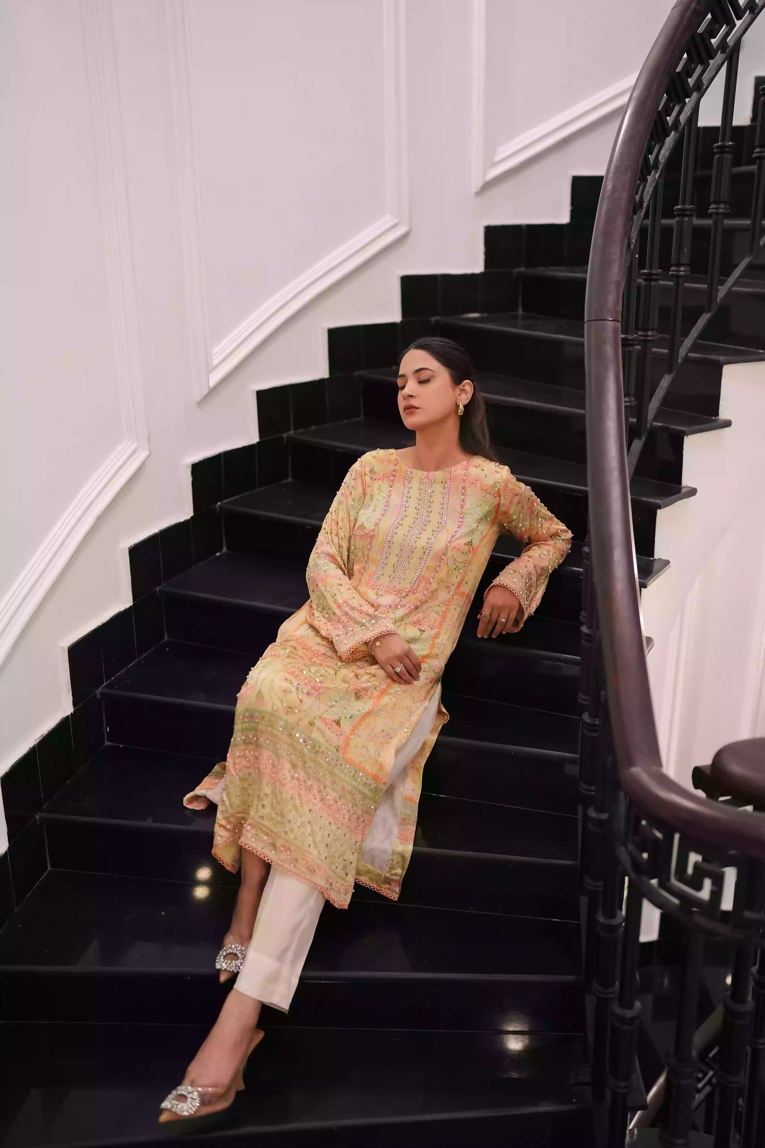 Lime yellow silk kurta in a soft pastel tone, featuring intricate floral embellishment on full-length sleeves, and a relaxed elegant silhouette, designed for festive eid gatherings, daytime celebrations, and refined evening wear.
