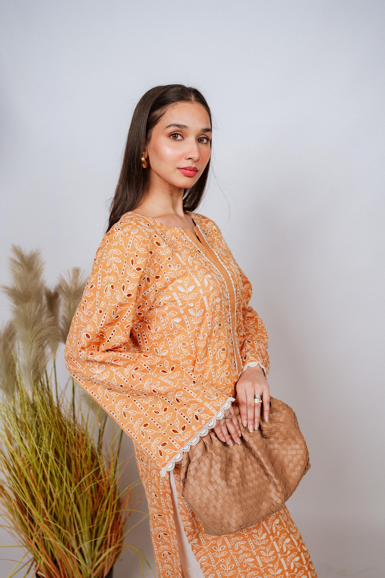 Mustard Chikan kurta with off-white floral embroidery and lace neckline