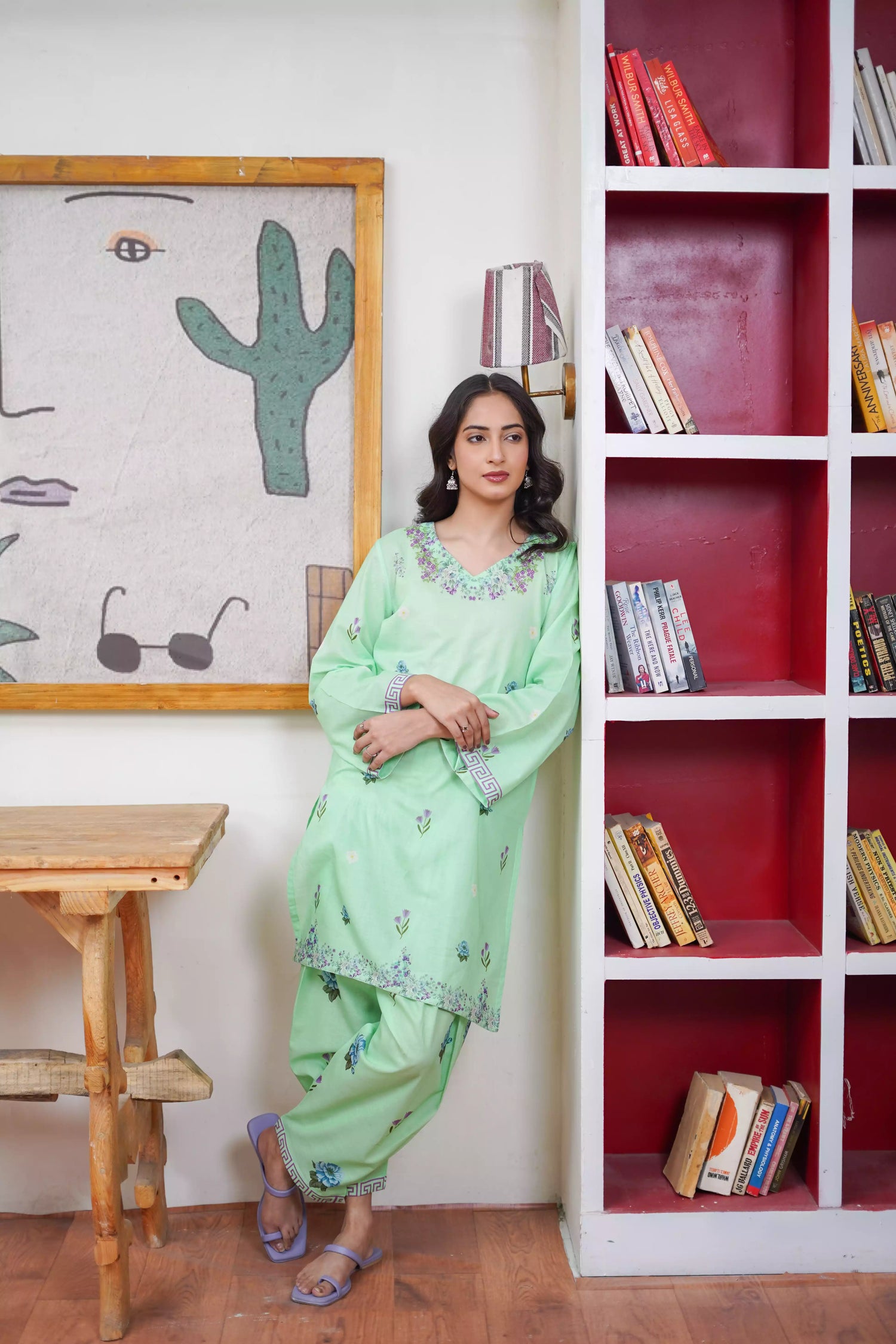 Mint green 2-piece suit with a breezy silhouette and delicate floral patterns, featuring a flattering cut and soft pastel tone, ideal for casual and semi-formal wear.