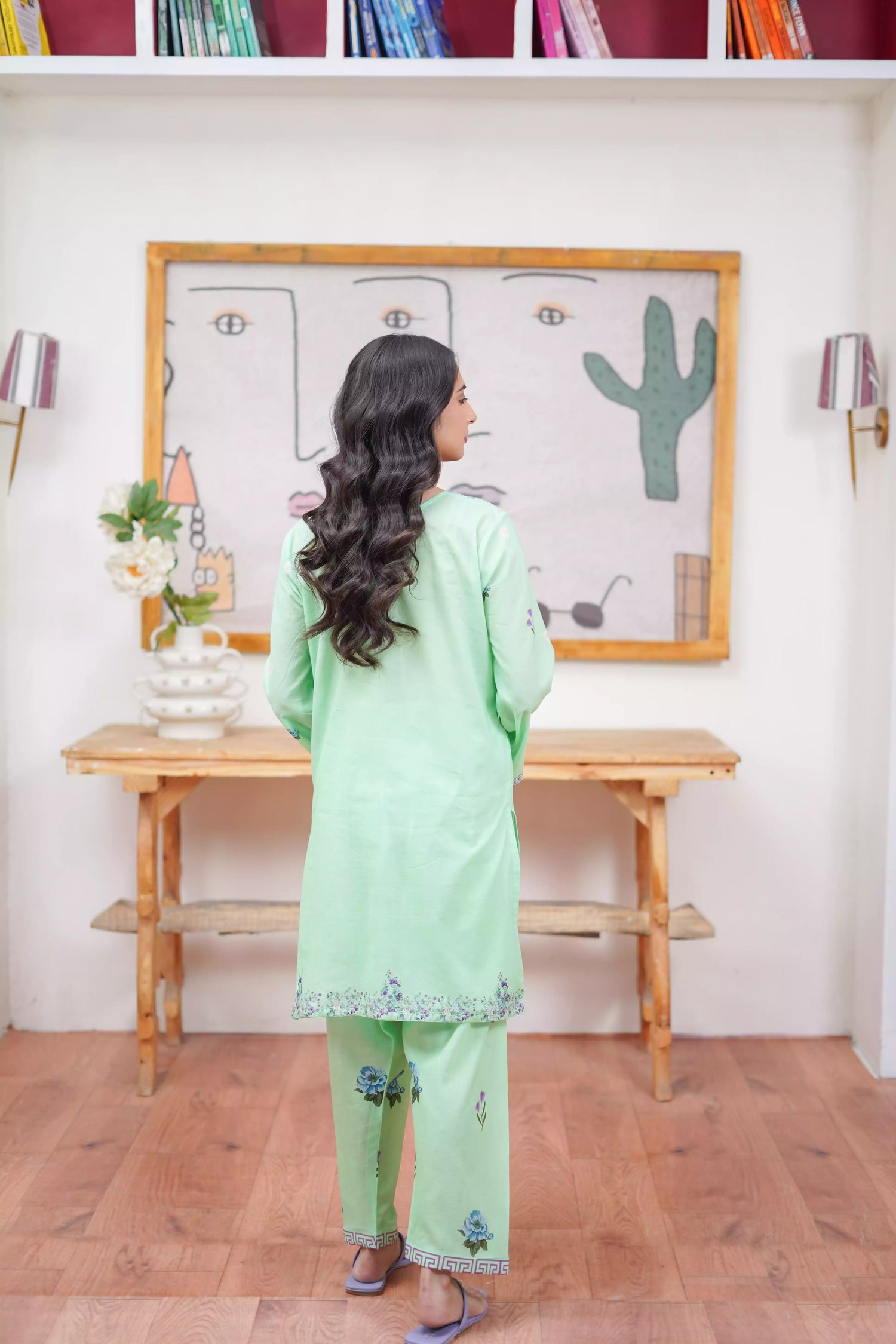 Mint green 2-piece suit with a breezy silhouette and delicate floral patterns, featuring a flattering cut and soft pastel tone, ideal for casual and semi-formal wear.
