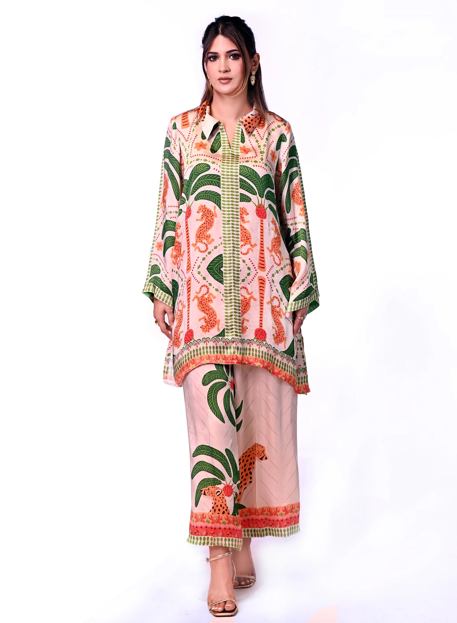 An elegant jungle-themed ensemble crafted from breathable summer silk, showcasing intricate floral patterns, towering palm motifs, and majestic tiger illustrations offering a blend of exotic elegance and comfort.