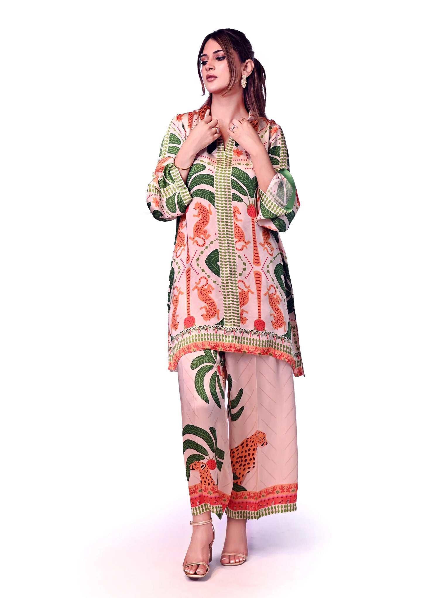 An elegant jungle-themed ensemble crafted from breathable summer silk, showcasing intricate floral patterns, towering palm motifs, and majestic tiger illustrations offering a blend of exotic elegance and comfort.