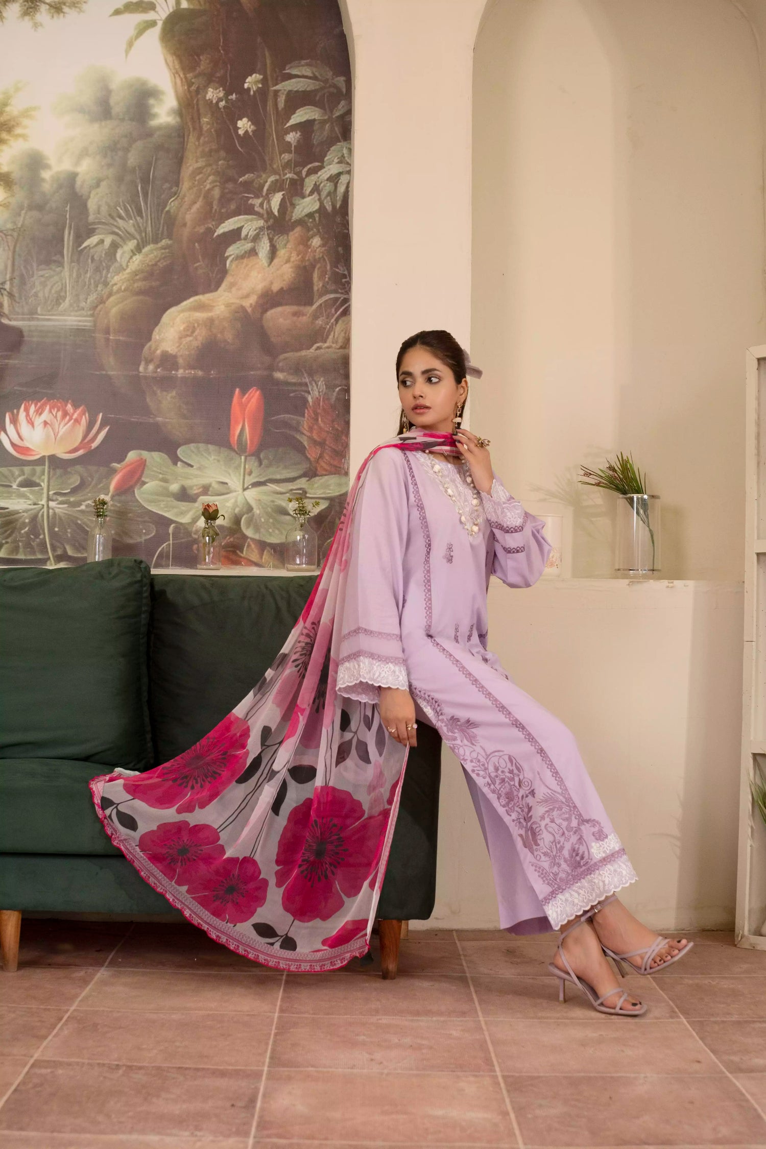 Elegant lilac suit with white embroidery, complemented by a pink rose-printed silk dupatta for a festive look.
