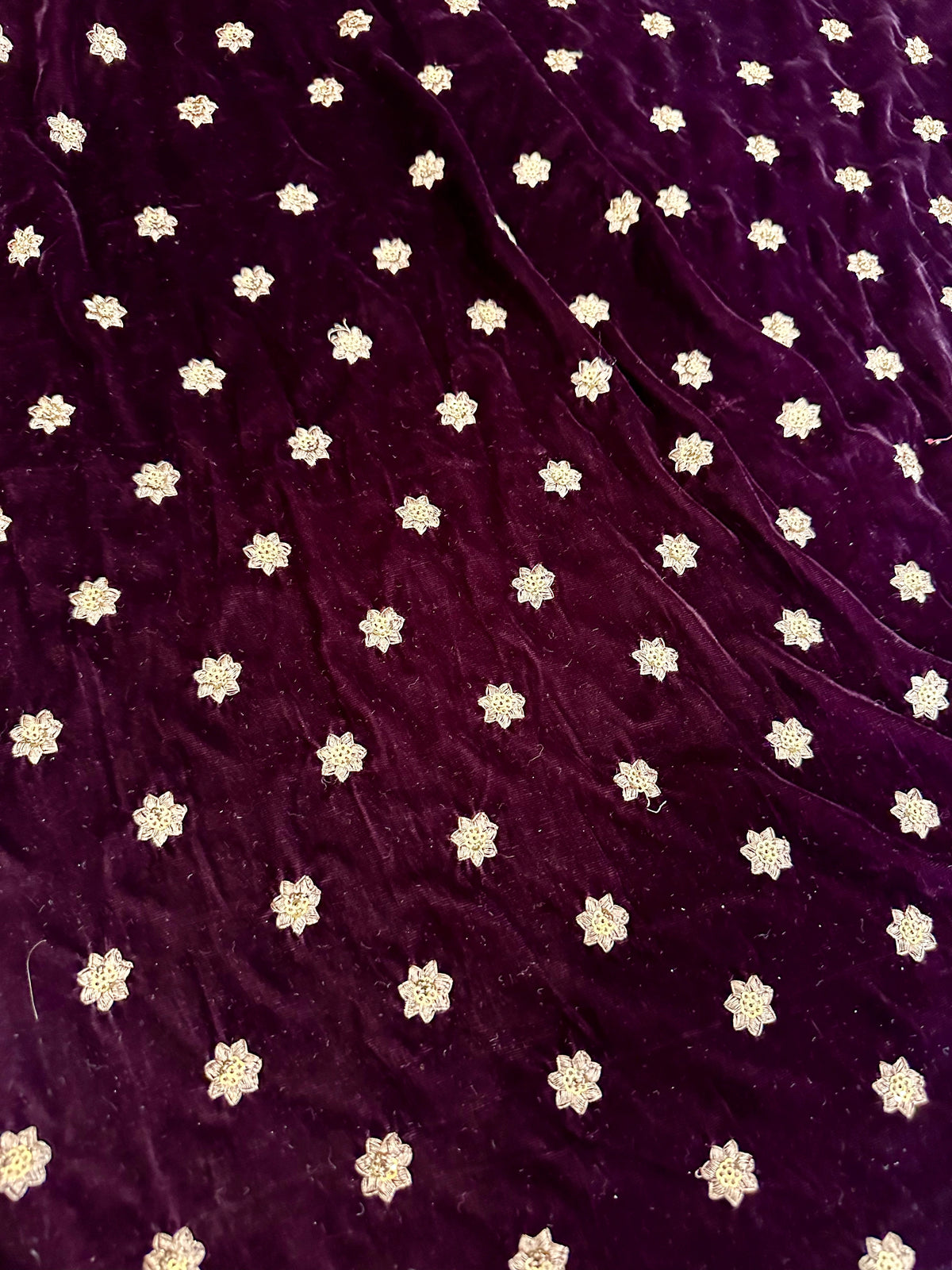Luxurious lilac velvet shawl with intricate tila and sequin embroidery, draped elegantly, perfect for evening wear or special occasions.