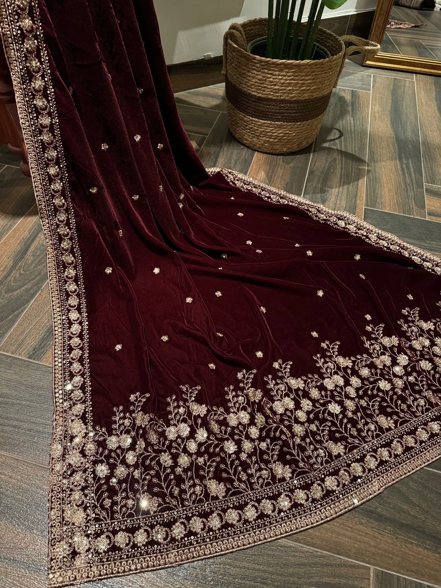 Maroon embroidered velvet shawl features traditional tilla floral work, with delicate motifs ideal for festive look.