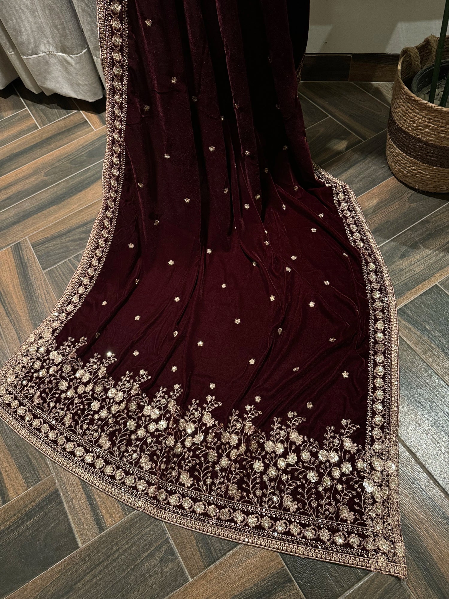 Maroon embroidered velvet shawl features traditional tilla floral work, with delicate motifs ideal for festive look.