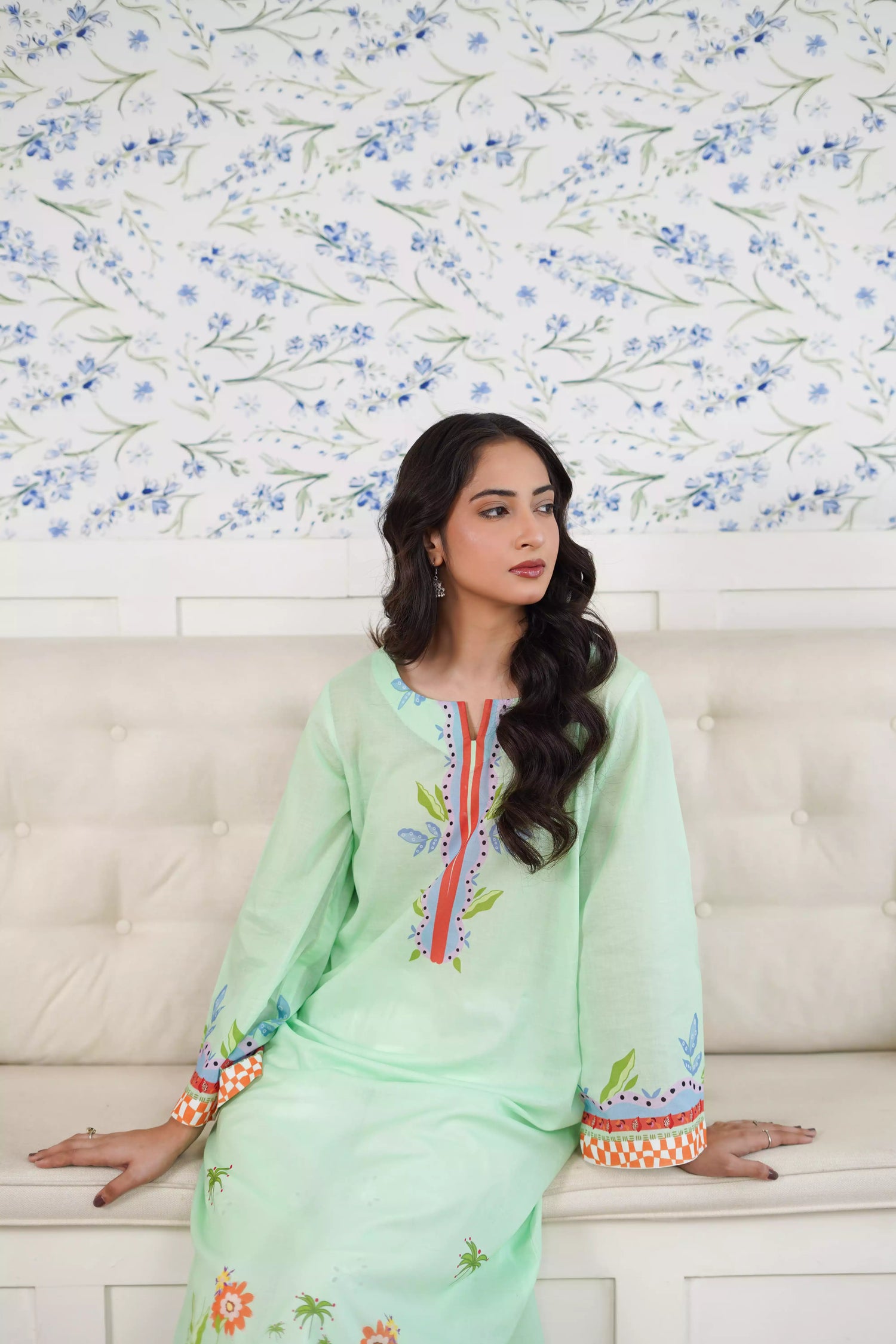 Elegant green kurta suit with beautiful nature inspired print, perfect for adding a touch of sophistication to any outfit.