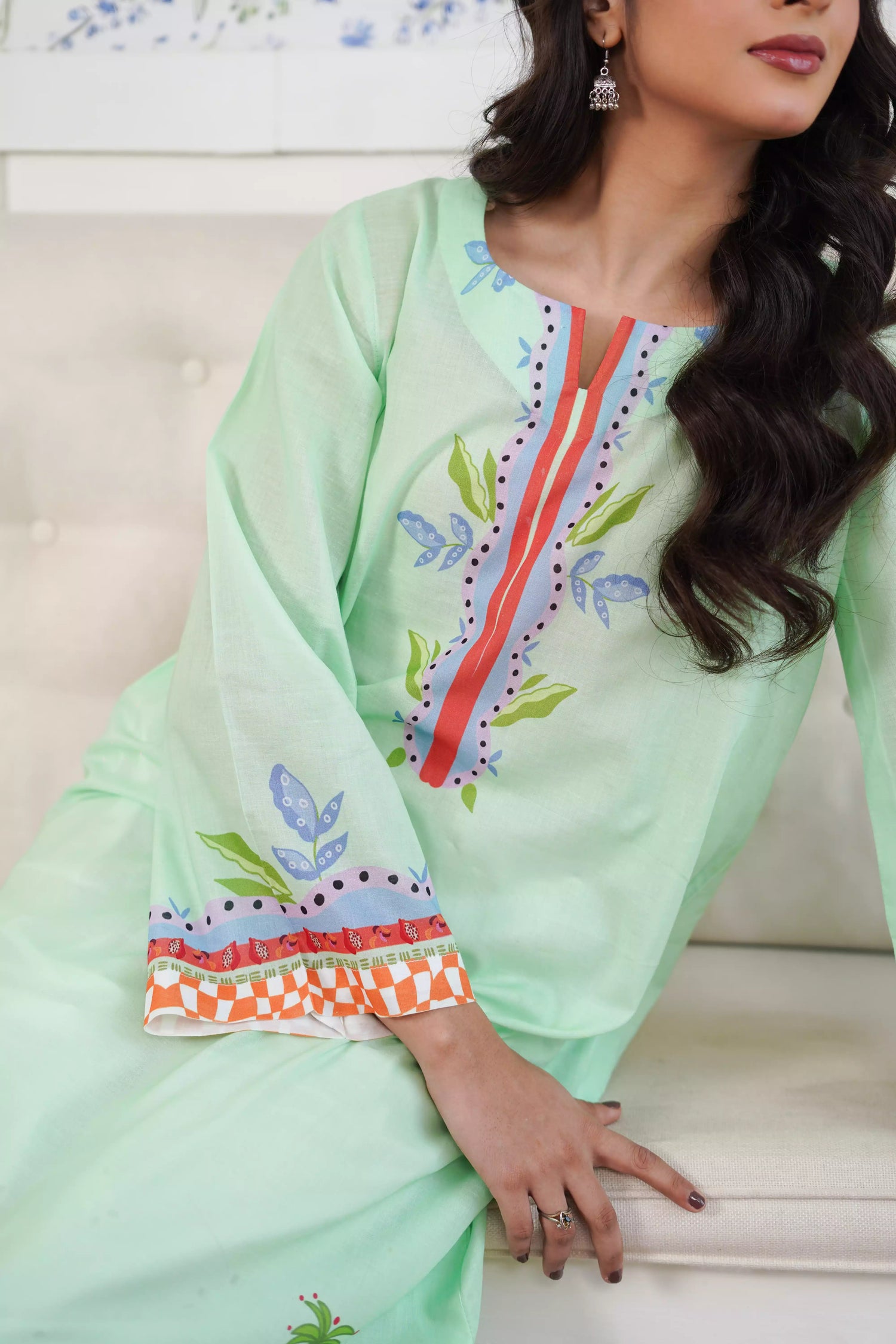 Elegant green kurta suit with beautiful nature inspired print, perfect for adding a touch of sophistication to any outfit.