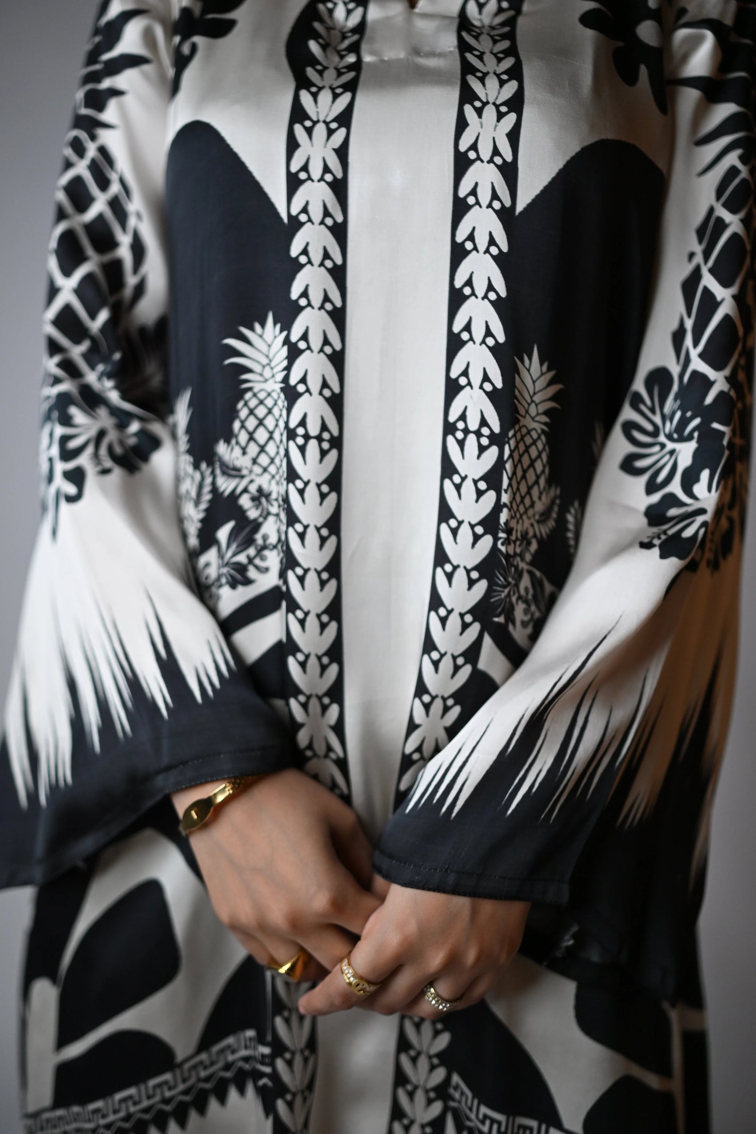 A black and white printed cord set featuring oversized floral and pineapple designs, exuding effortless elegance.