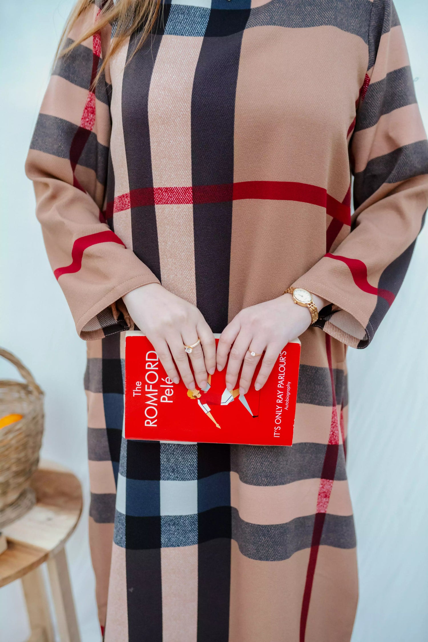 Striped shirt with bold vertical lines, paired with wide flared pants. The outfit blends modern tailoring with a touch of retro style, perfect for casual occasions.