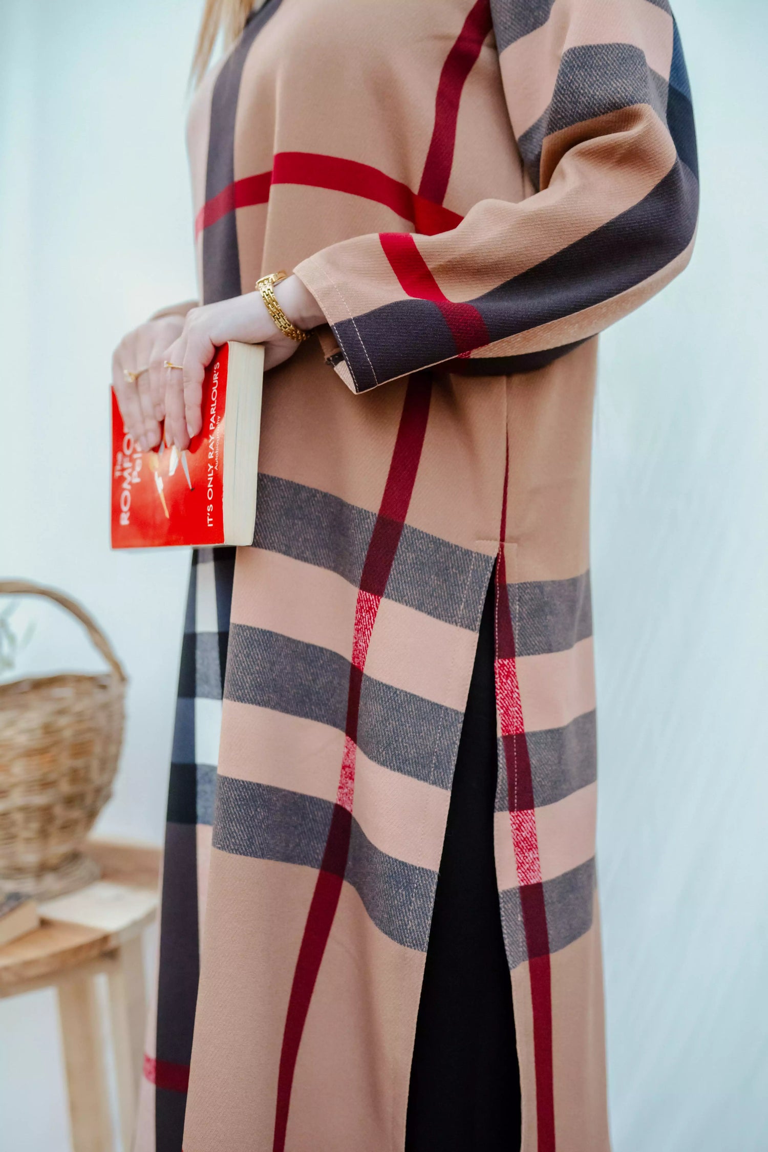 Striped shirt with bold vertical lines, paired with wide flared pants. The outfit blends modern tailoring with a touch of retro style, perfect for casual occasions.