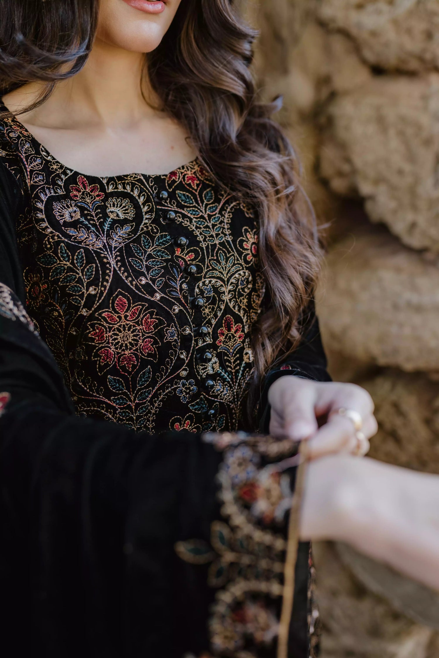 Black velvet suit features intricate multi-thread embroidery on the shirt, paired with plain velvet pants and a matching velvet shawl with embroidered borders for a refined, luxurious look.