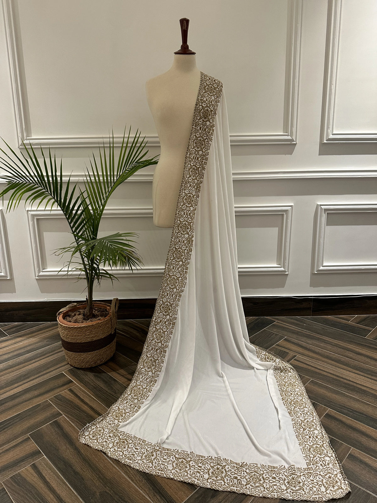 Velvet Shawl featuring a geometric border with intricate gold tilla embroidery. Ideal for Eid, or festive celebrations and heritage charm with modern elegance.