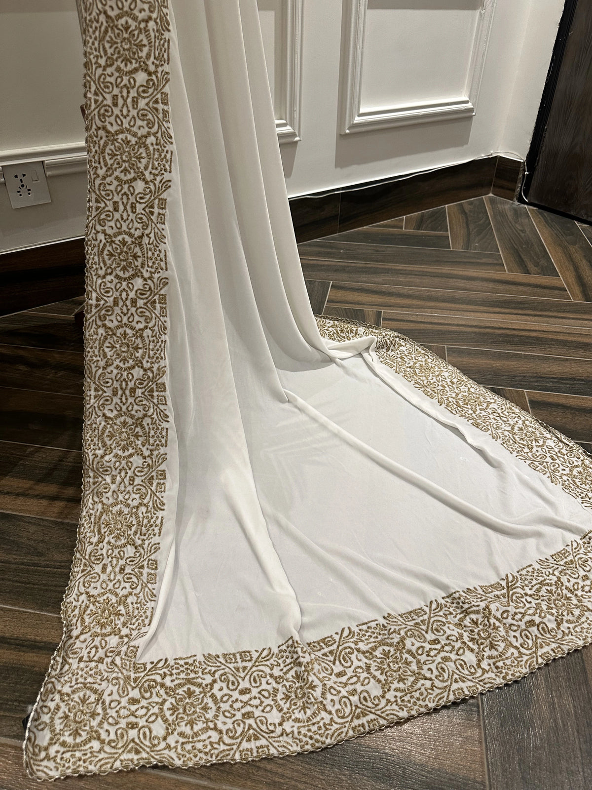 Velvet Shawl featuring a geometric border with intricate gold tilla embroidery. Ideal for Eid, or festive celebrations and heritage charm with modern elegance.