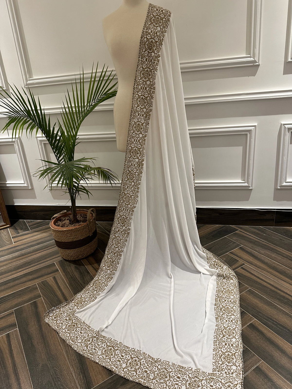 Velvet Shawl featuring a geometric border with intricate gold tilla embroidery. Ideal for Eid, or festive celebrations and heritage charm with modern elegance.