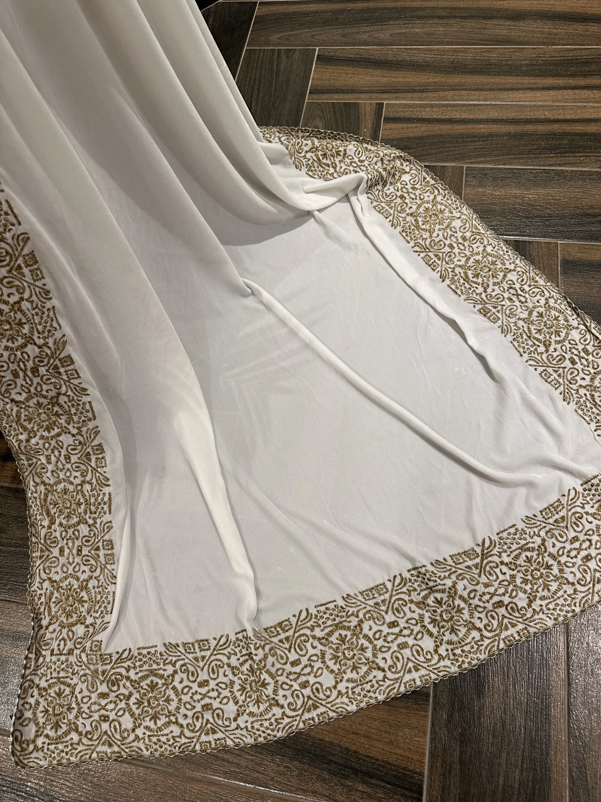 Velvet Shawl featuring a geometric border with intricate gold tilla embroidery. Ideal for Eid, or festive celebrations and heritage charm with modern elegance.
