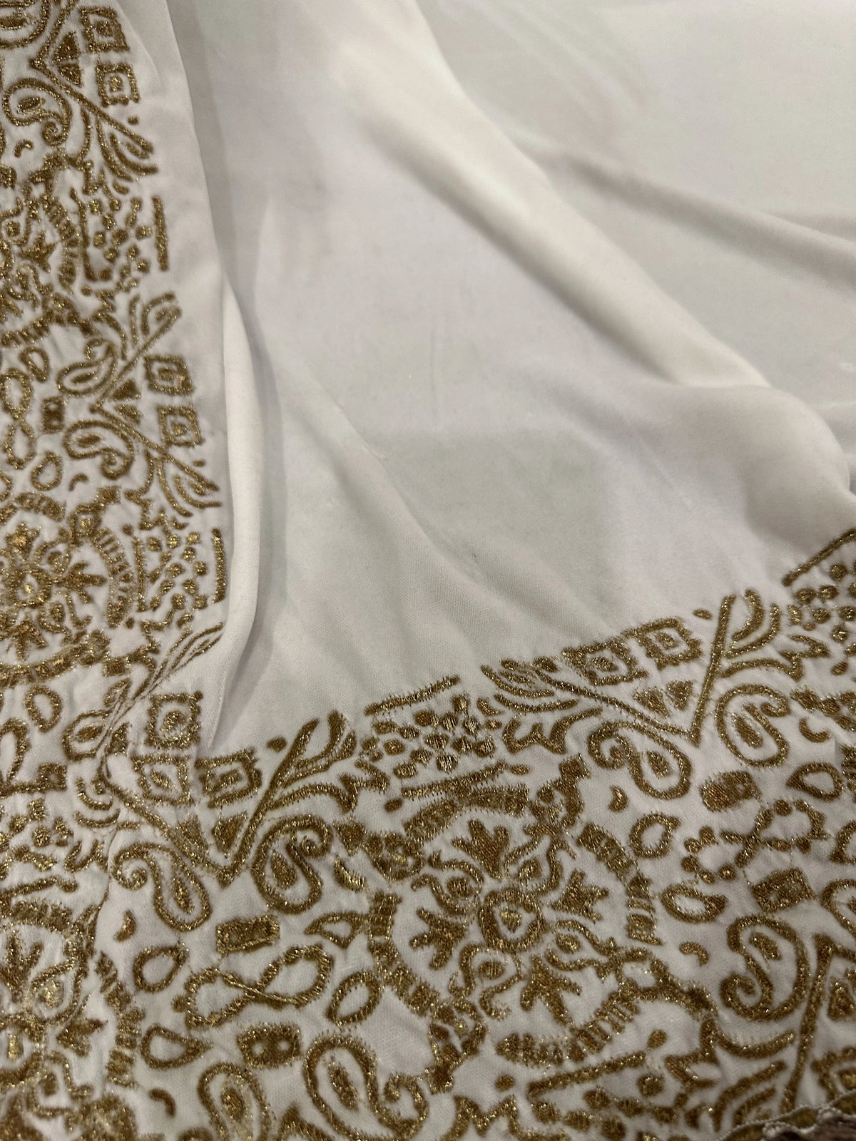 Velvet Shawl featuring a geometric border with intricate gold tilla embroidery. Ideal for Eid, or festive celebrations and heritage charm with modern elegance.