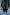 Emerald green velvet suit with cream thread embroidery, paired with an embroidered shawl and plain velvet pants for an elegant, luxurious look.