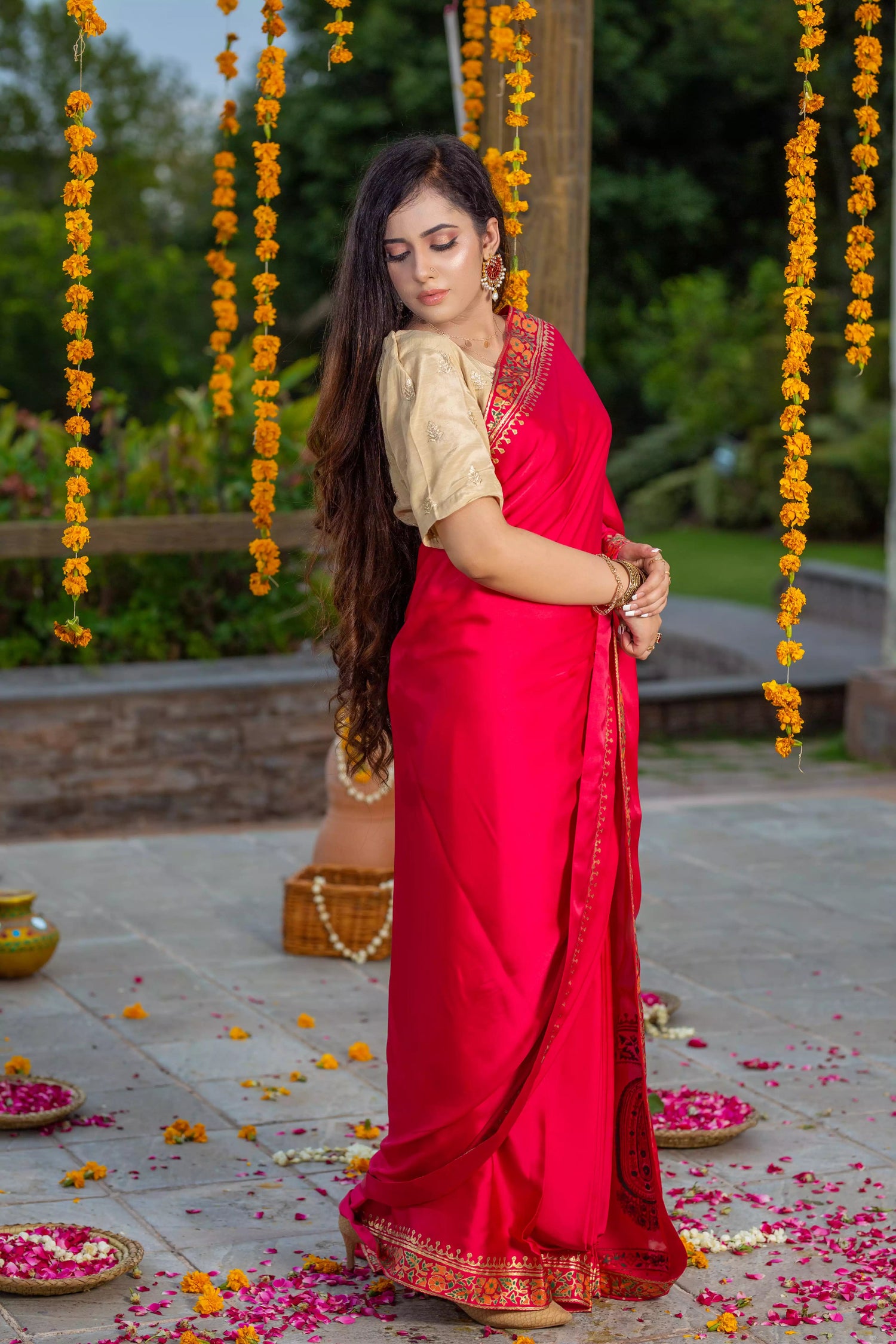 Elegant silk block printed saree with intricate border designs and heavy block printed pallu, paired with a tila embroidered blouse. Perfect for formal events.