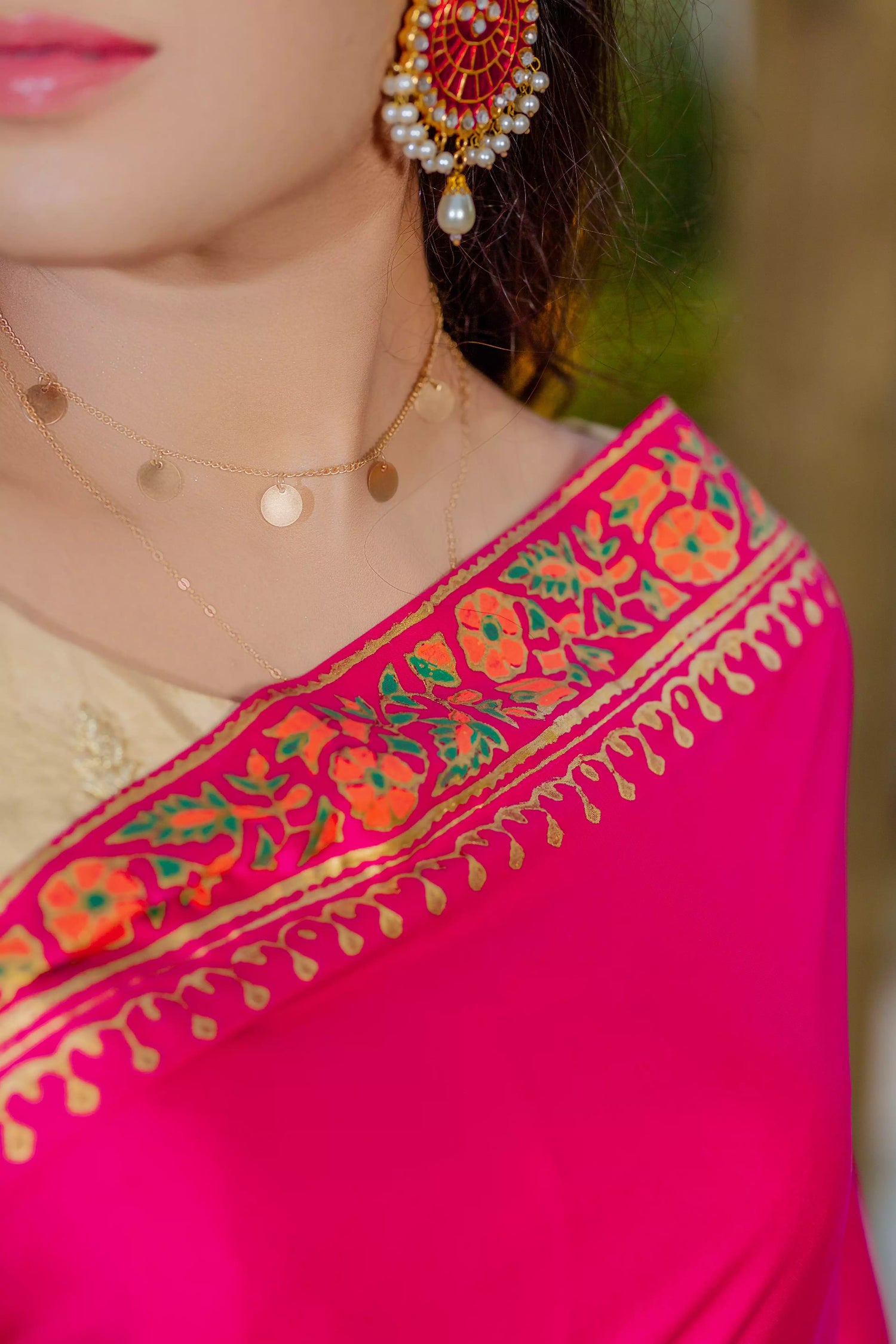 Elegant silk block printed saree with intricate border designs and heavy block printed pallu, paired with a tila embroidered blouse. Perfect for formal events.
