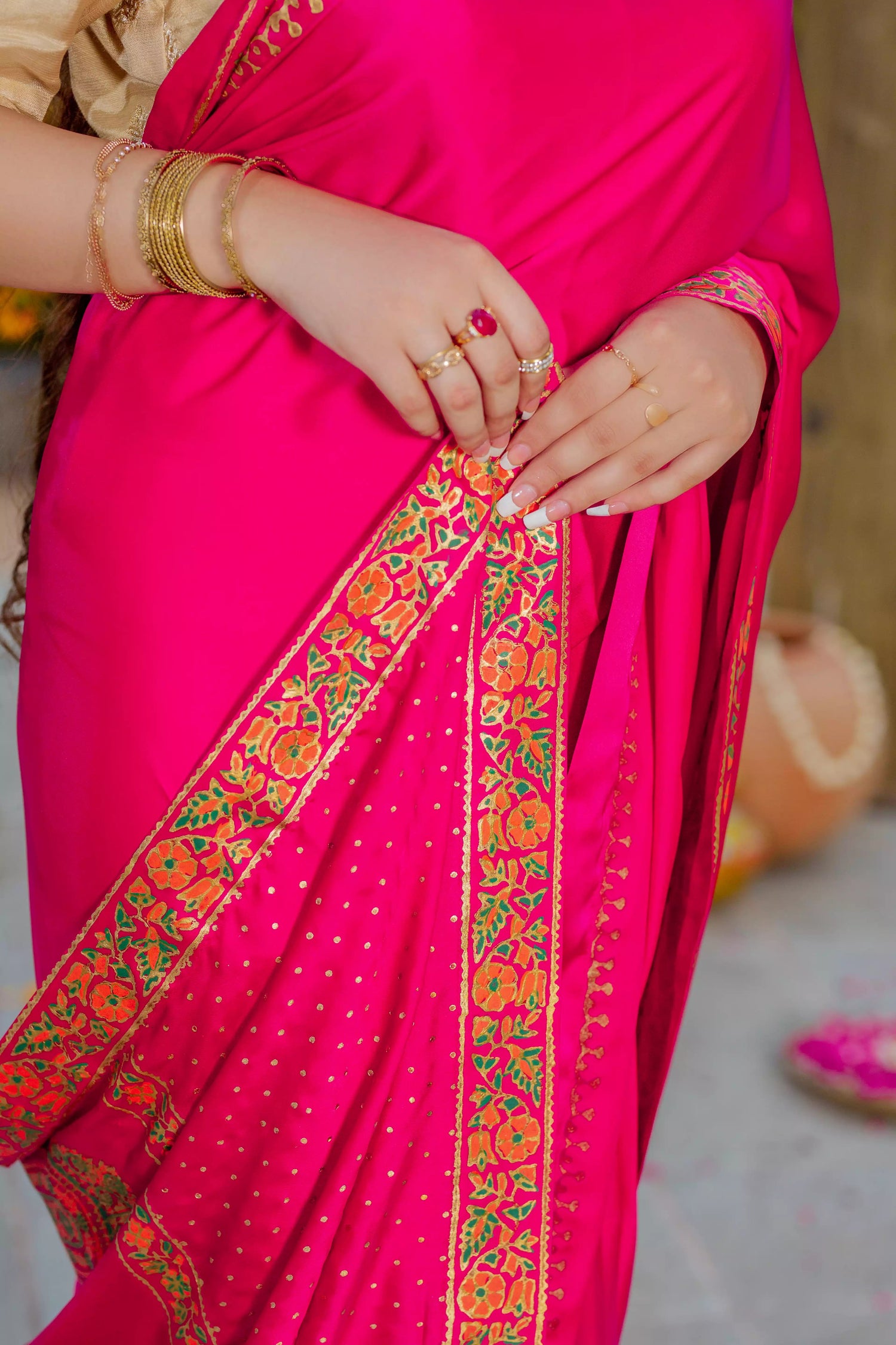 Elegant silk block printed saree with intricate border designs and heavy block printed pallu, paired with a tila embroidered blouse. Perfect for formal events.